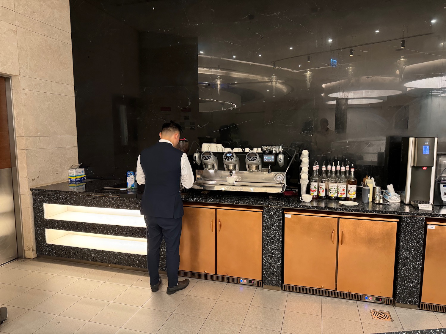 a man standing at a counter