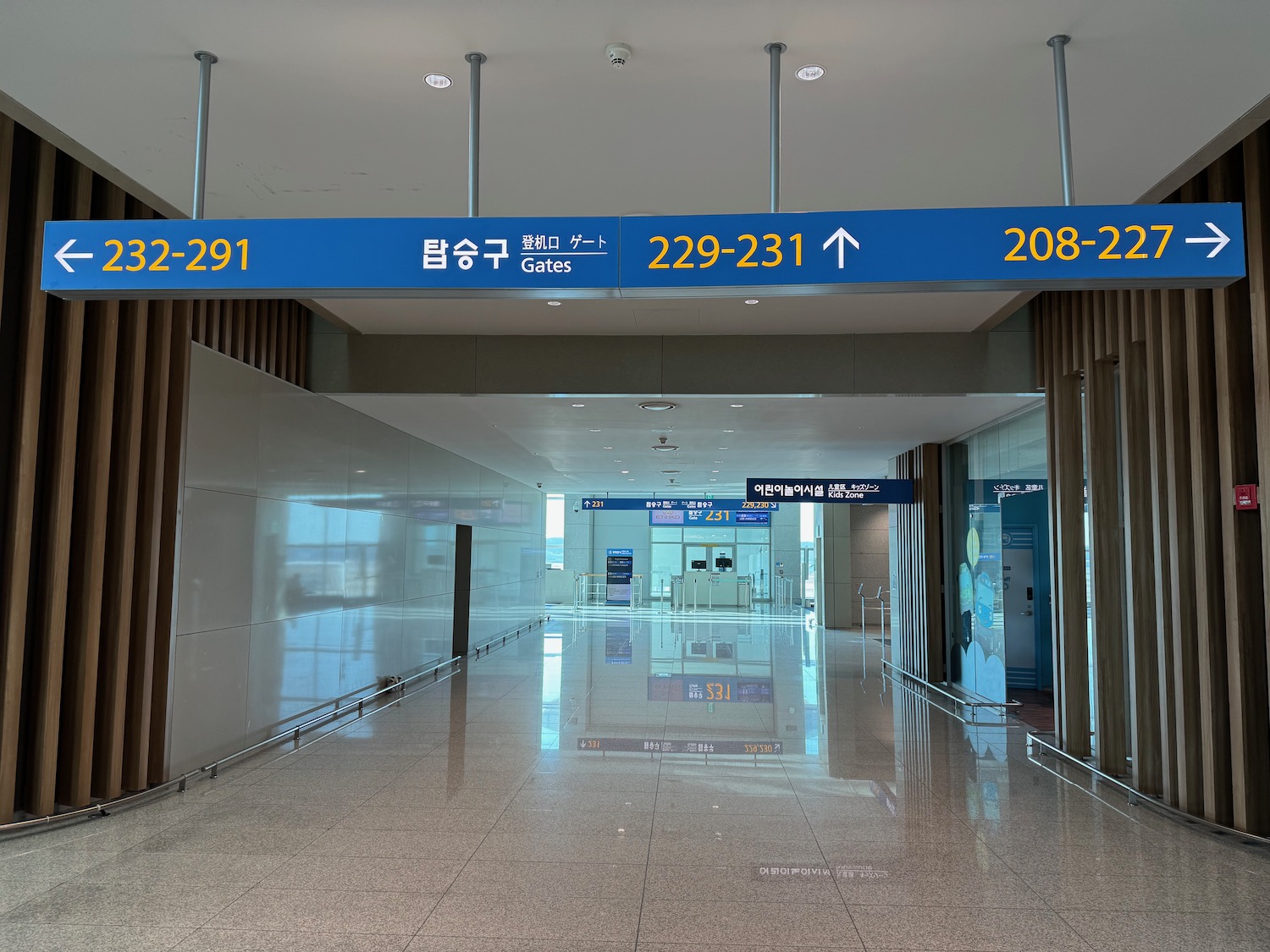 a hallway with signs and numbers