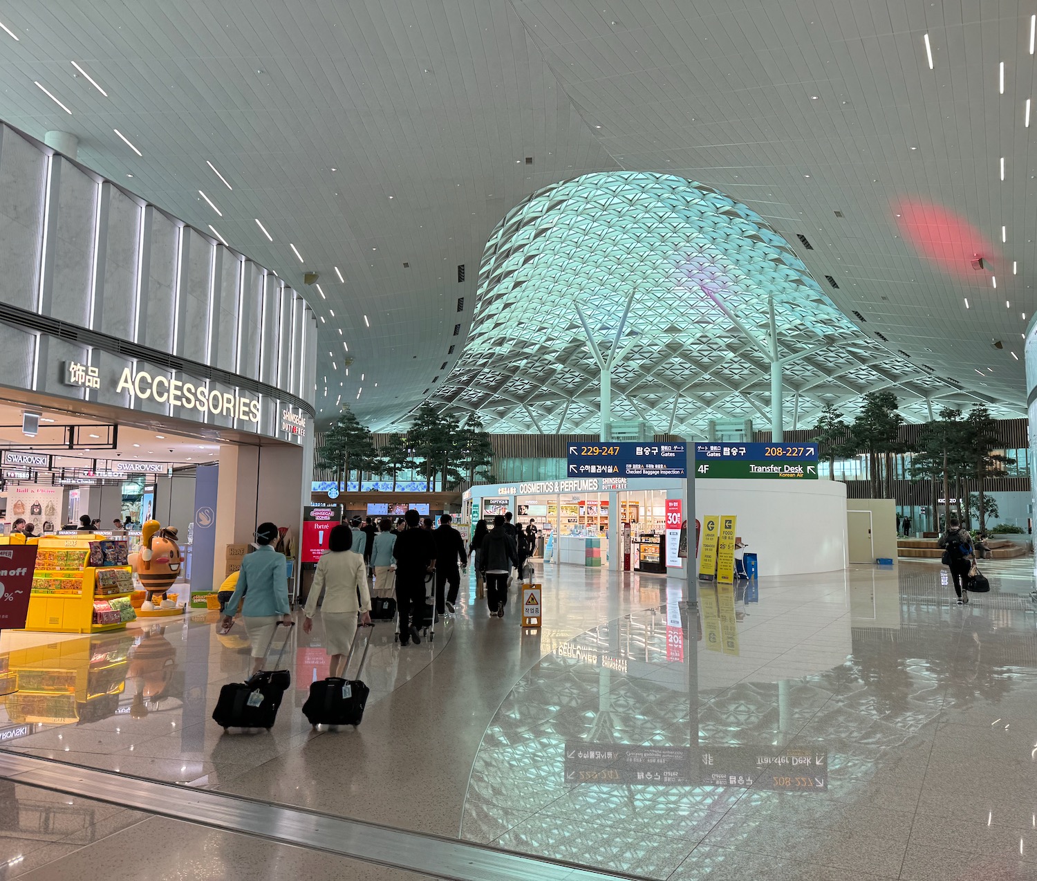 people walking in a large airport