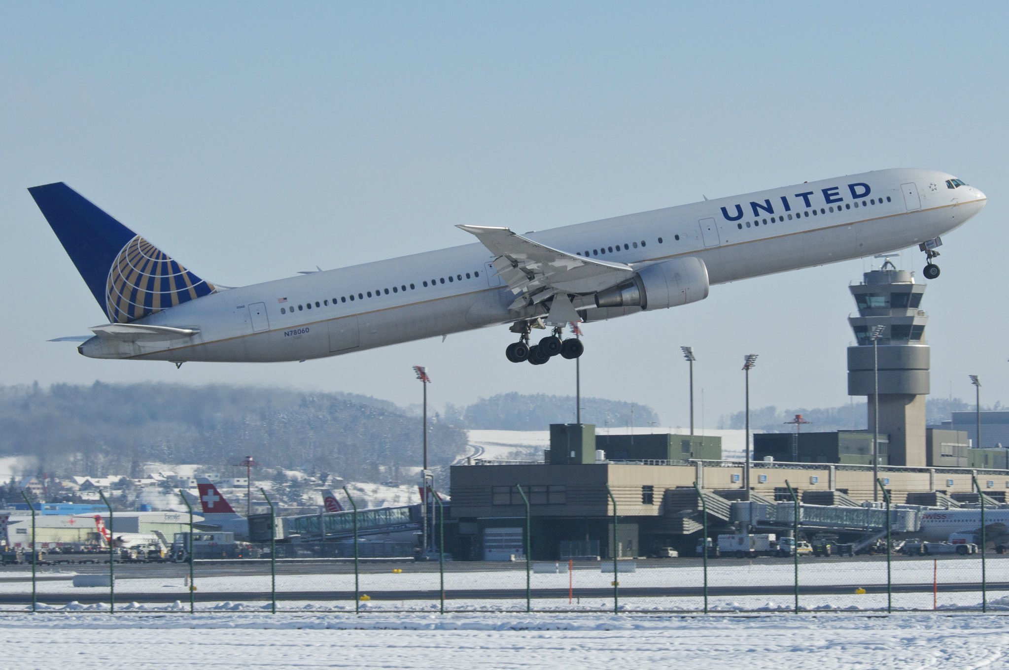 a plane taking off from a runway