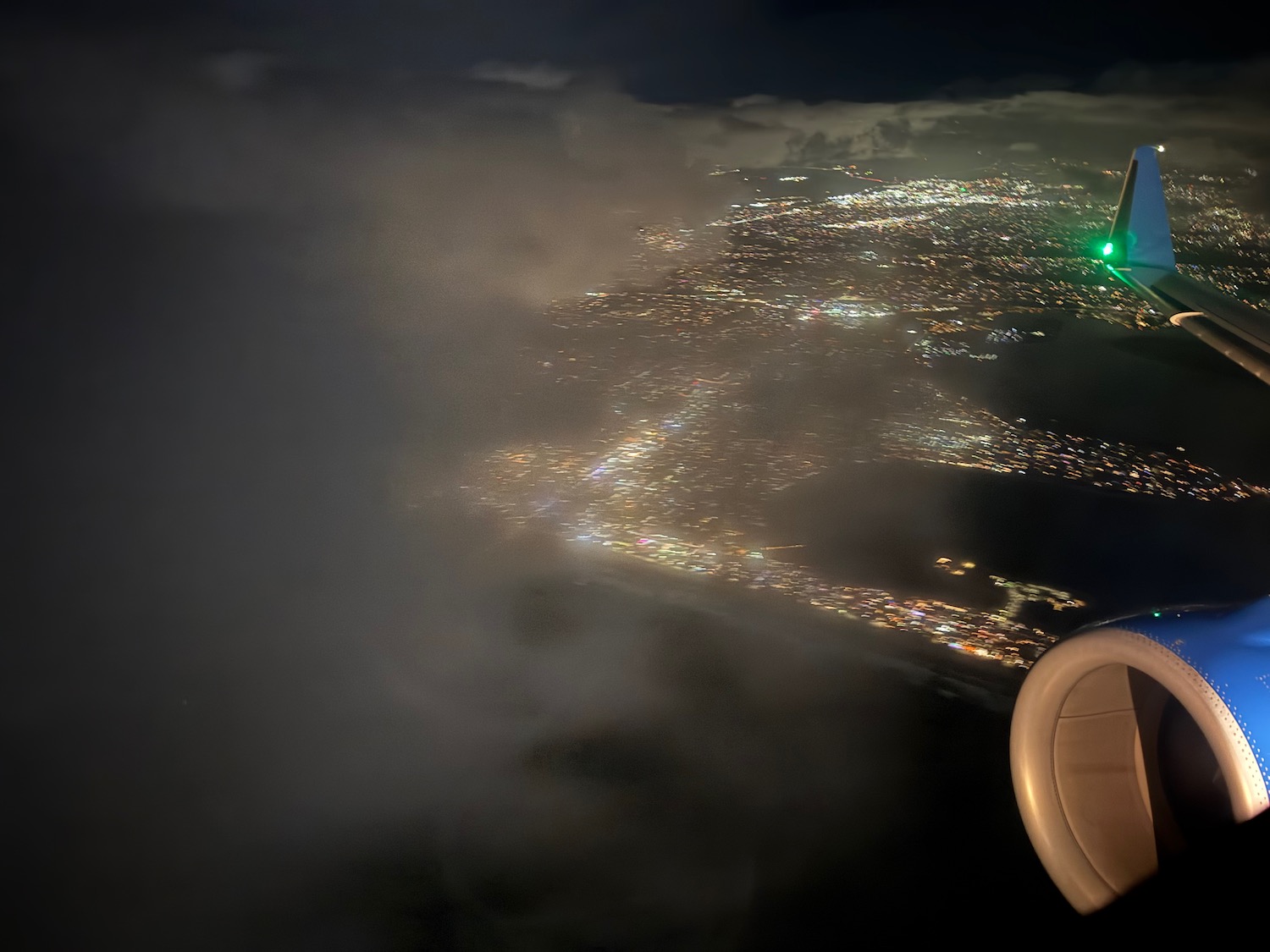 an aerial view of a city at night