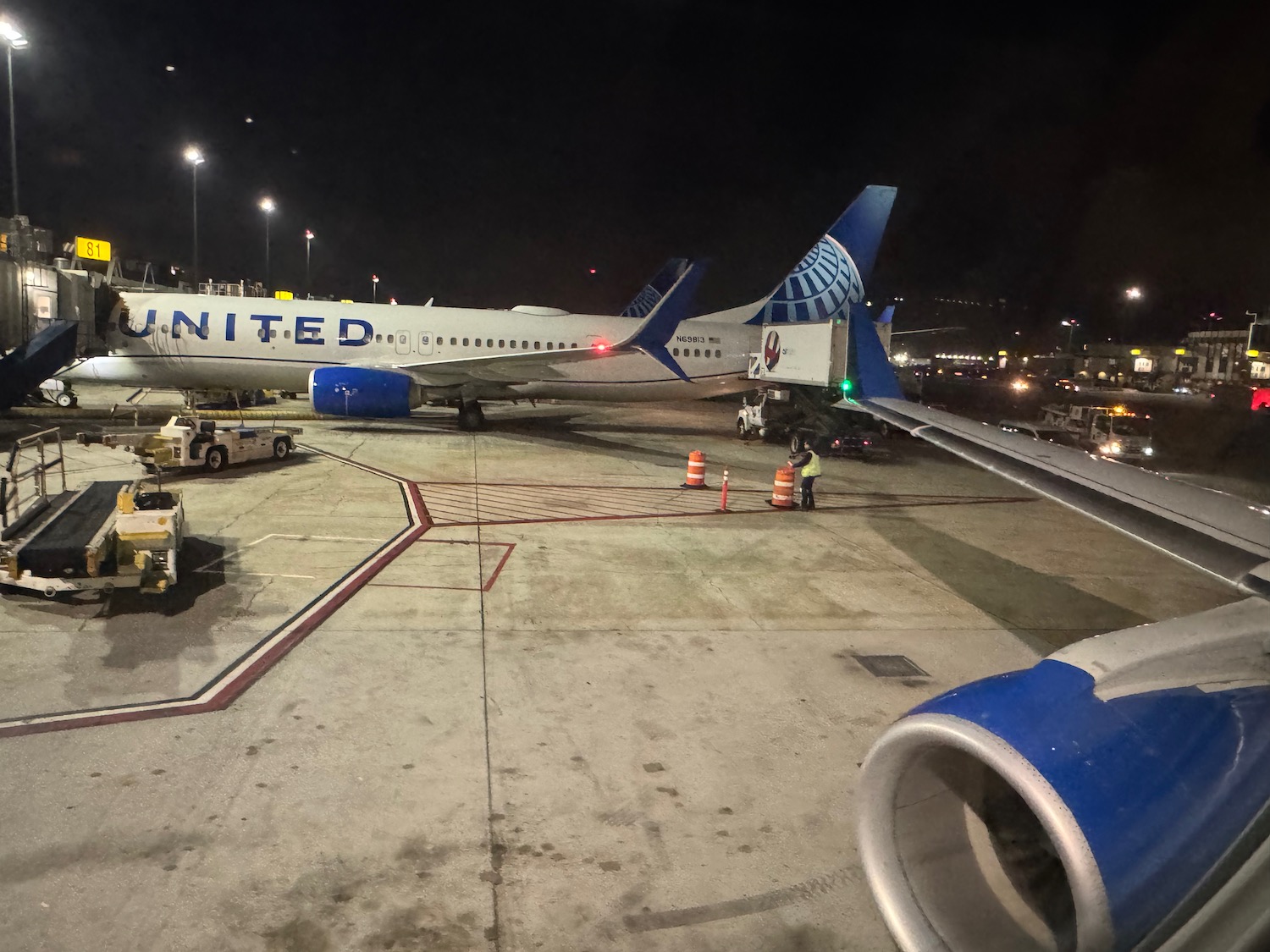 an airplane on the runway at night