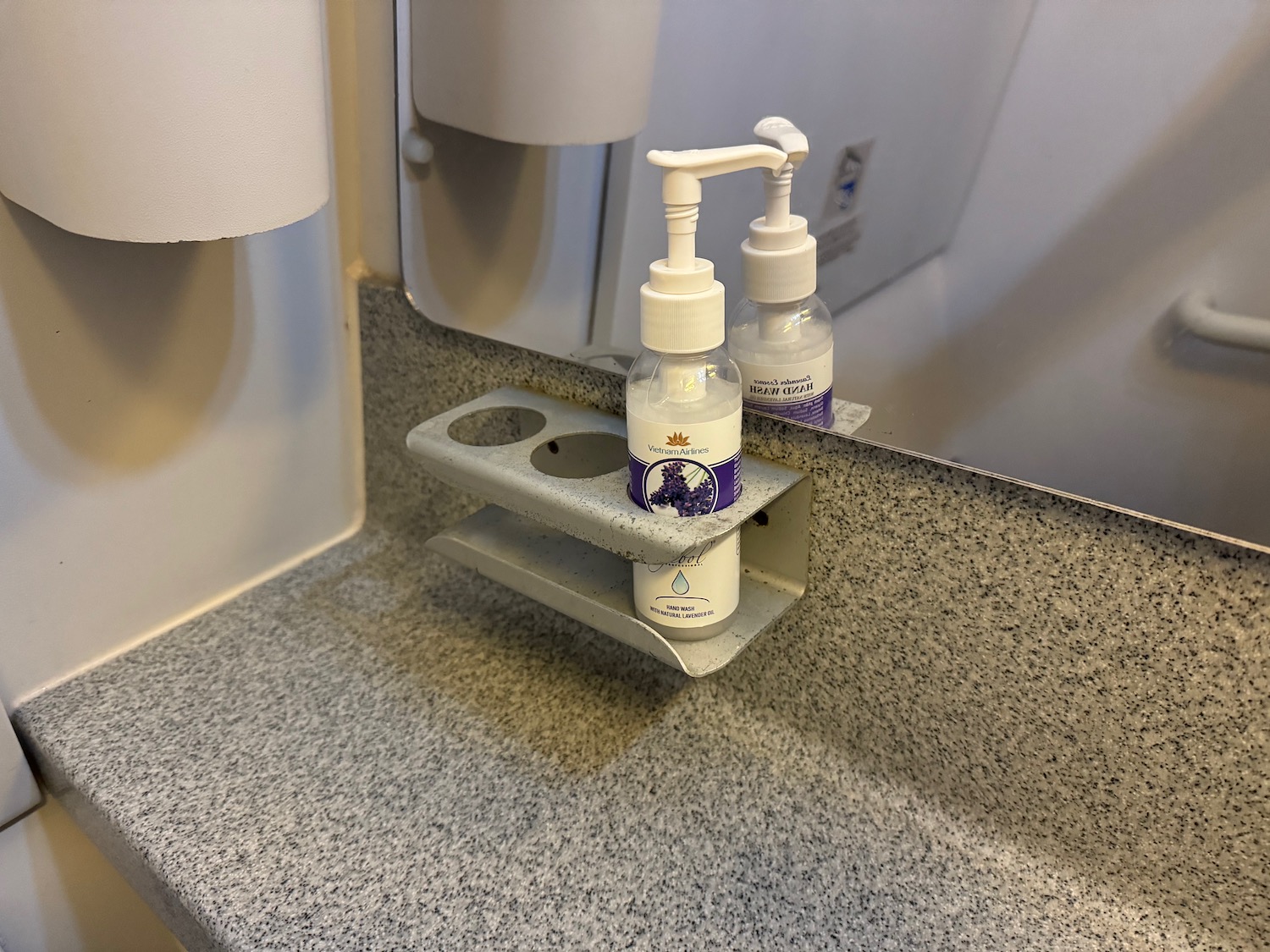 a soap dispenser on a counter