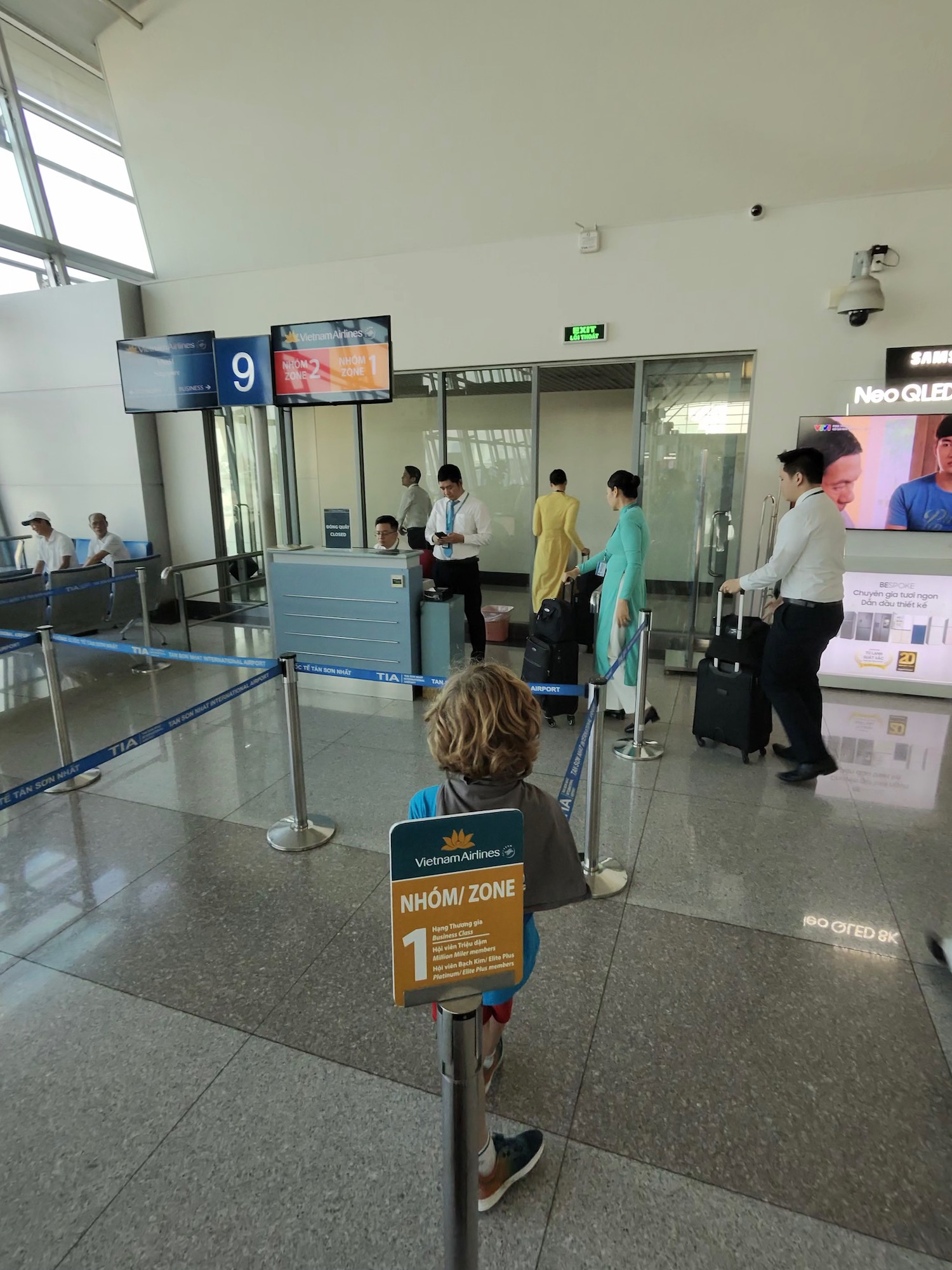 a group of people in an airport