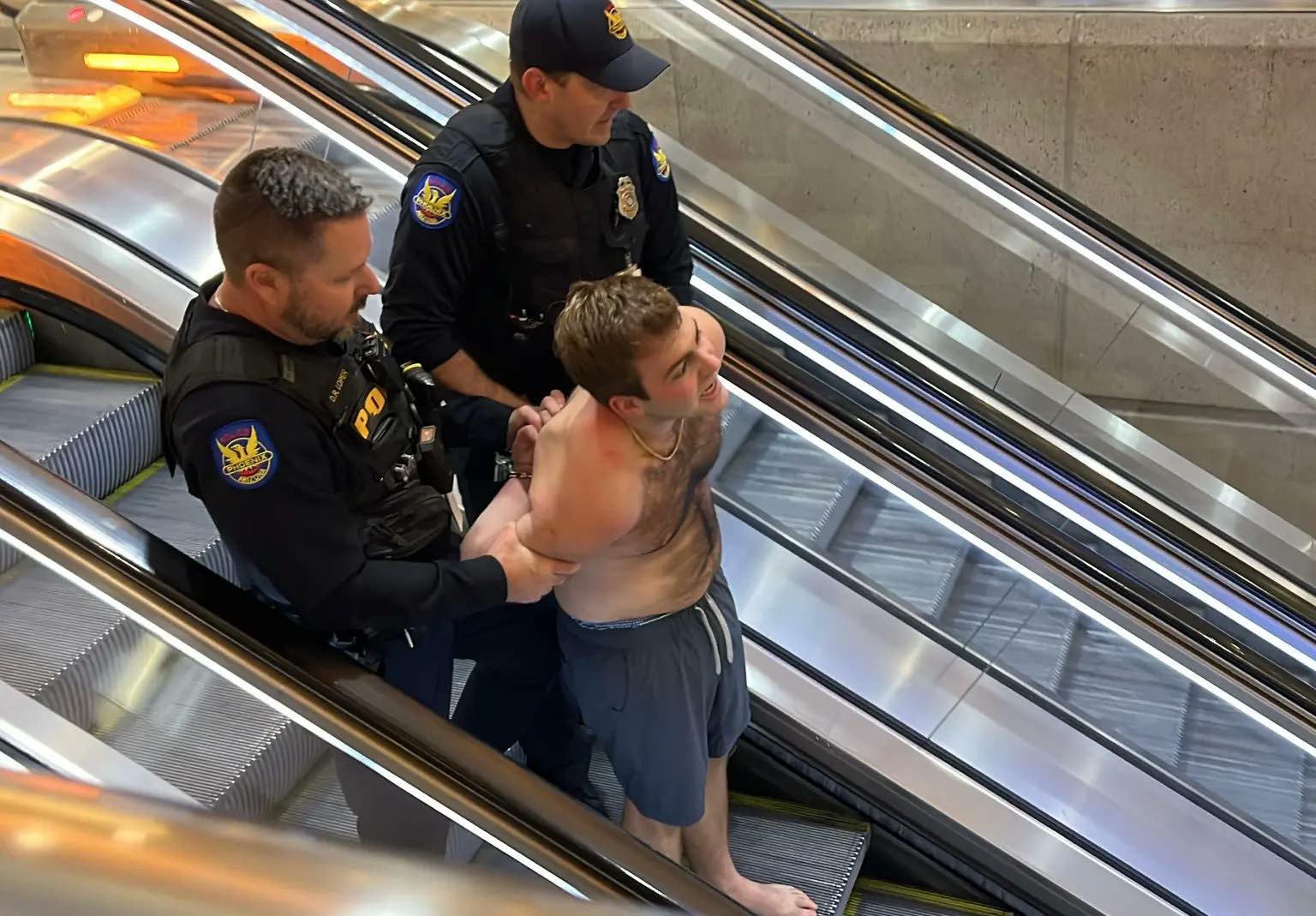 a man on an escalator