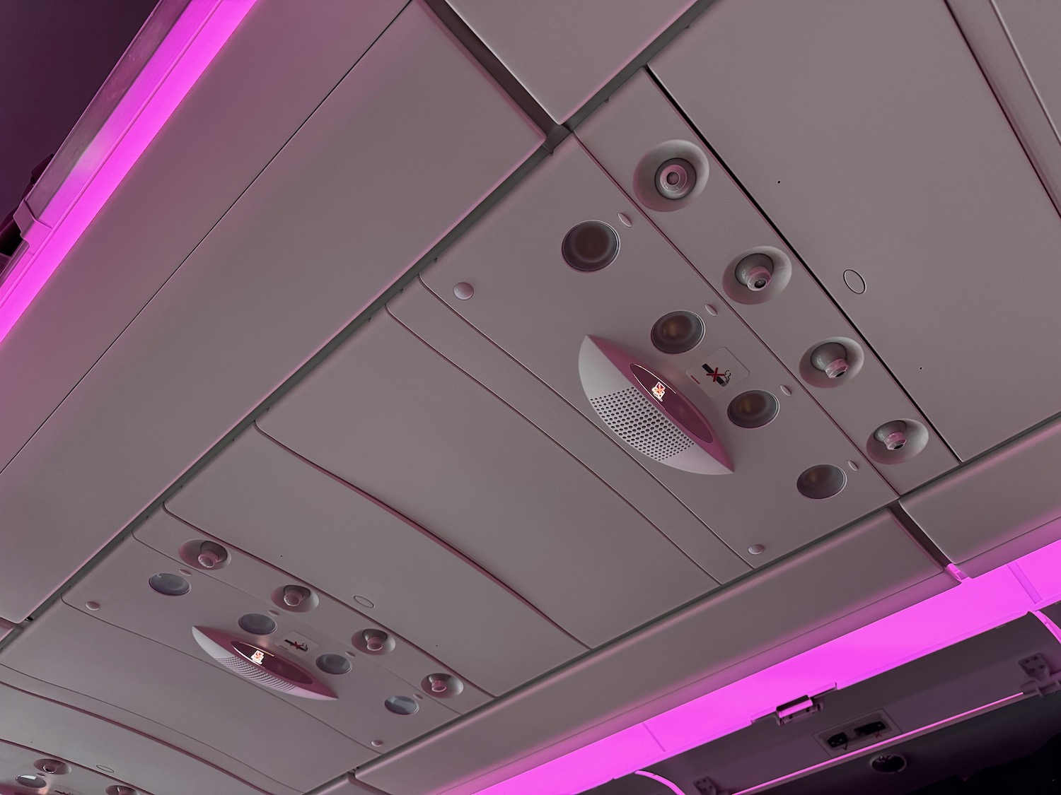 a ceiling with lights and speakers