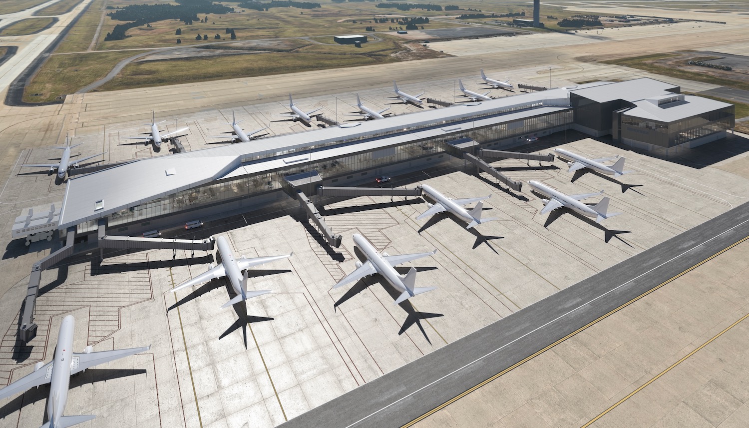 a group of airplanes parked at an airport