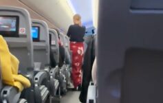 a woman walking on an airplane