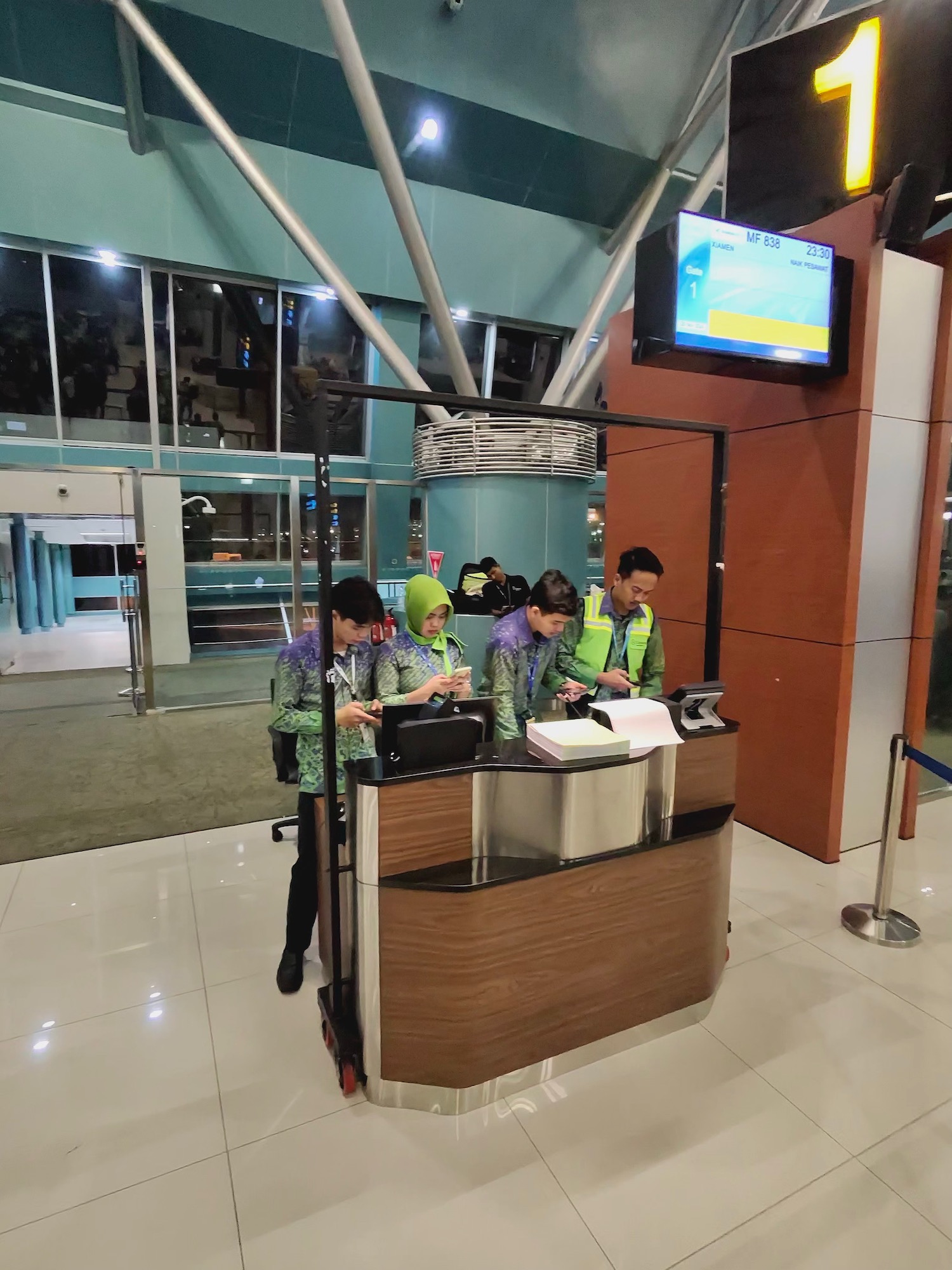 a group of people standing at a counter