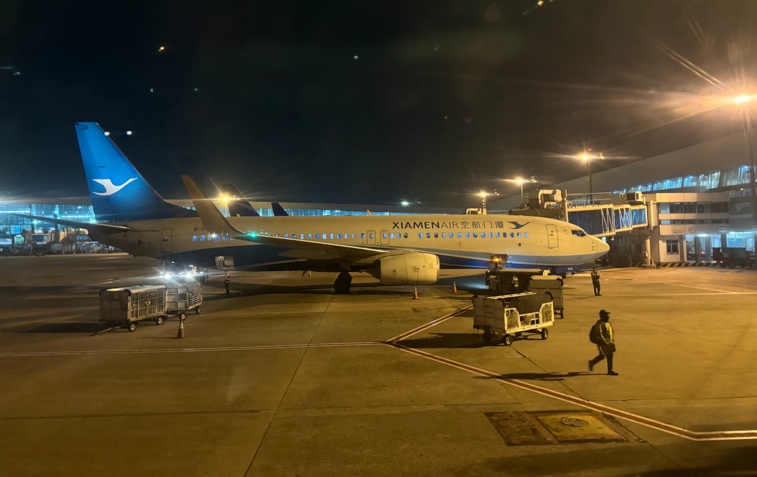 a plane on the tarmac at night