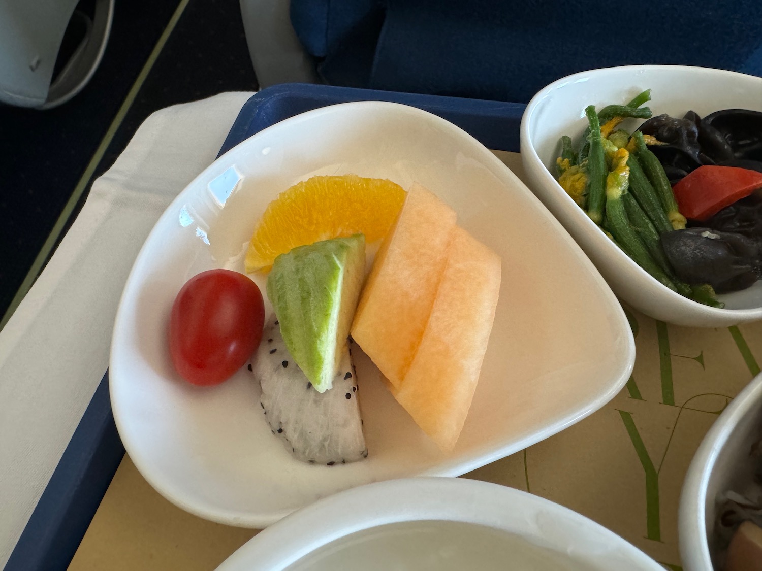 a plate of fruit and vegetables