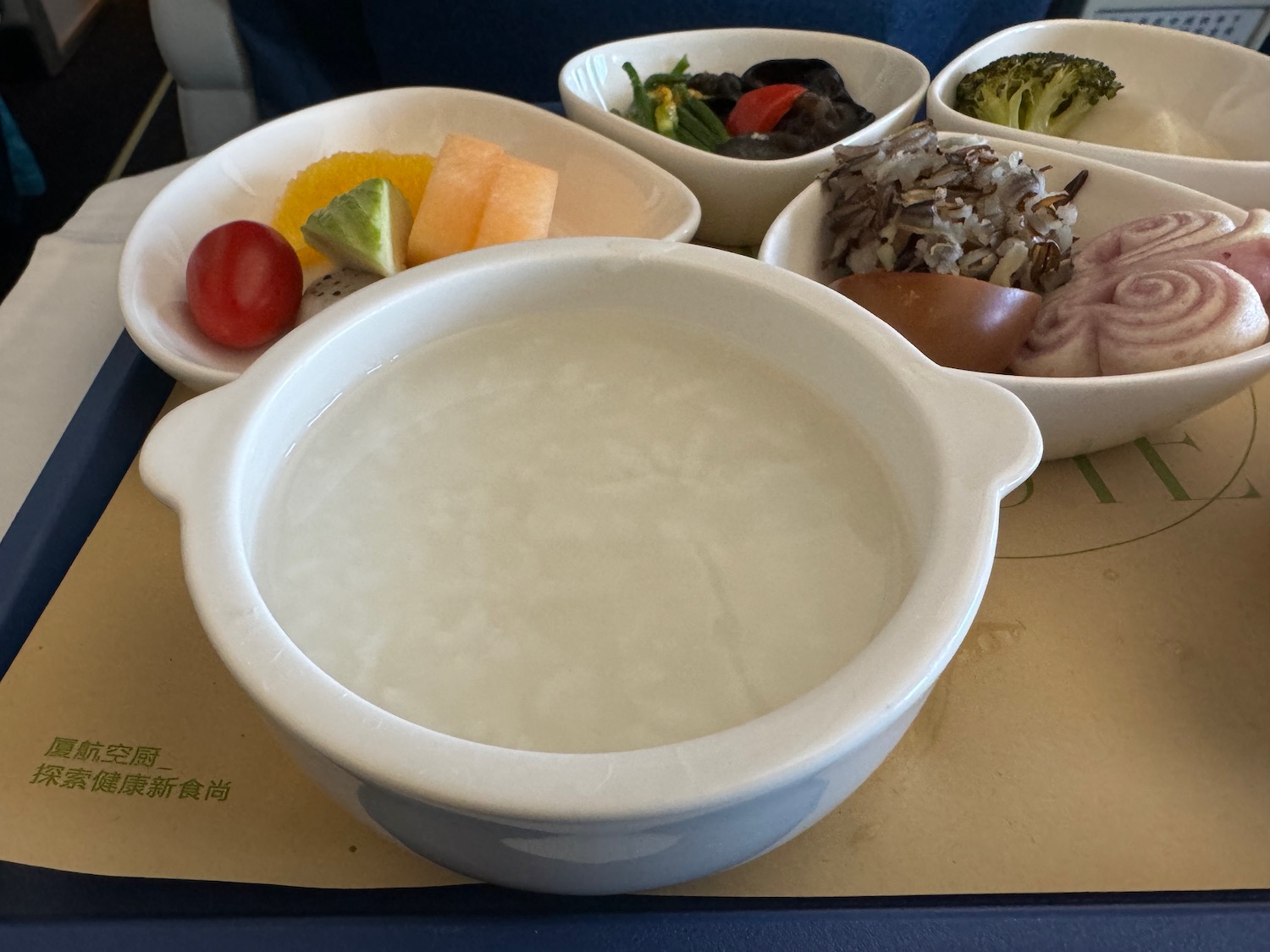 a bowl of food on a tray