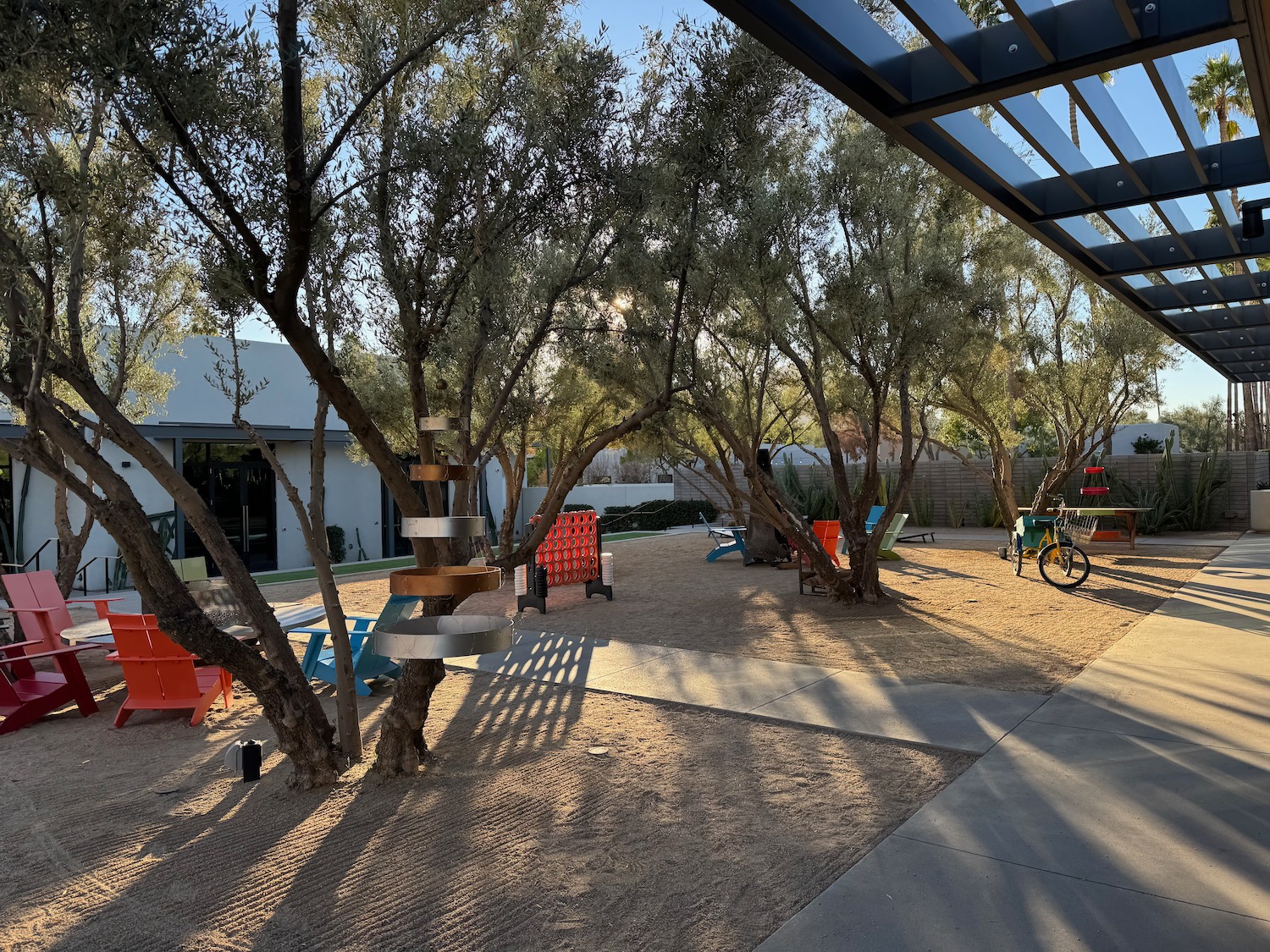 a playground with trees and a structure