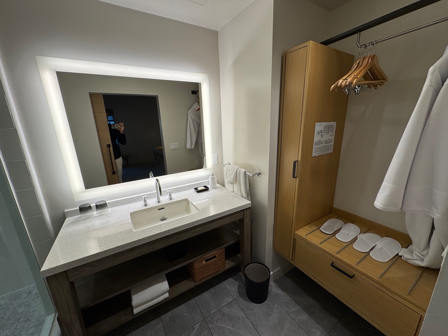 a bathroom with a mirror and a sink