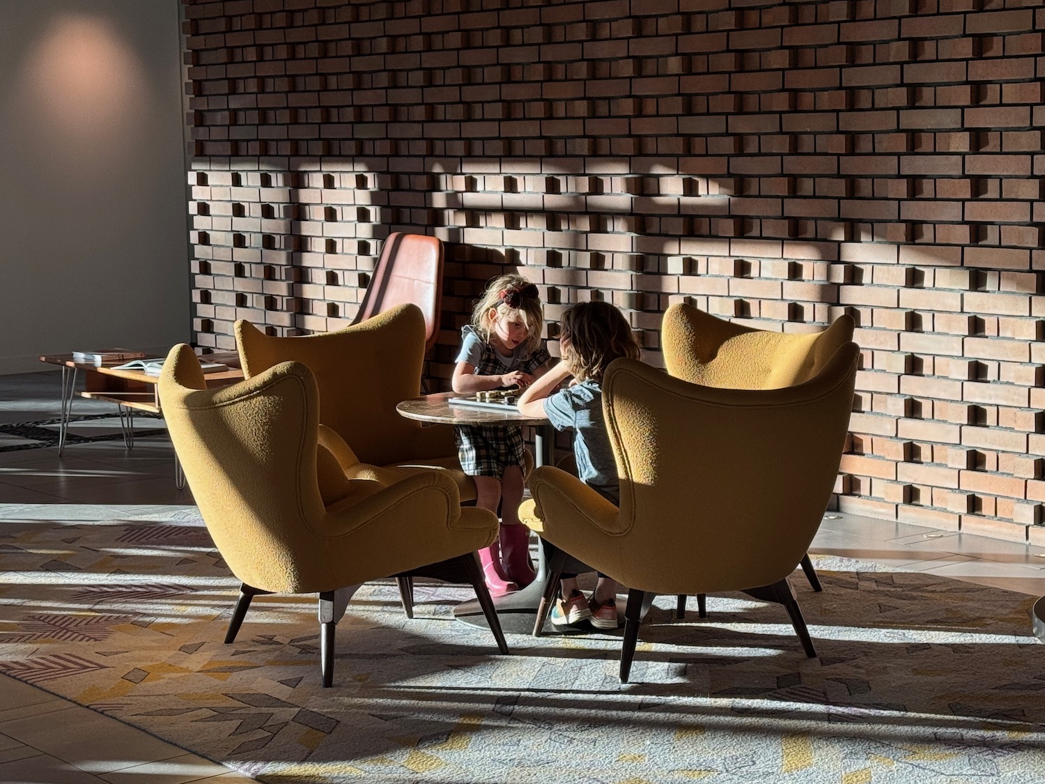 two children sitting at a table