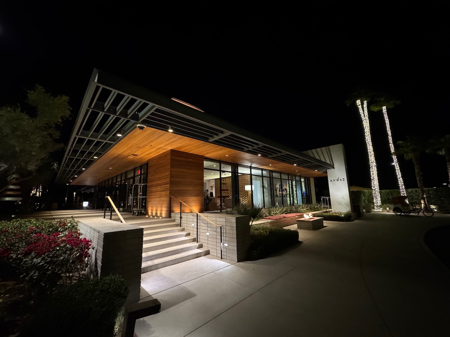 a building with a walkway and stairs