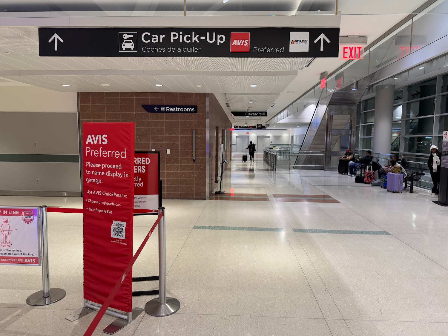 a red sign in a airport