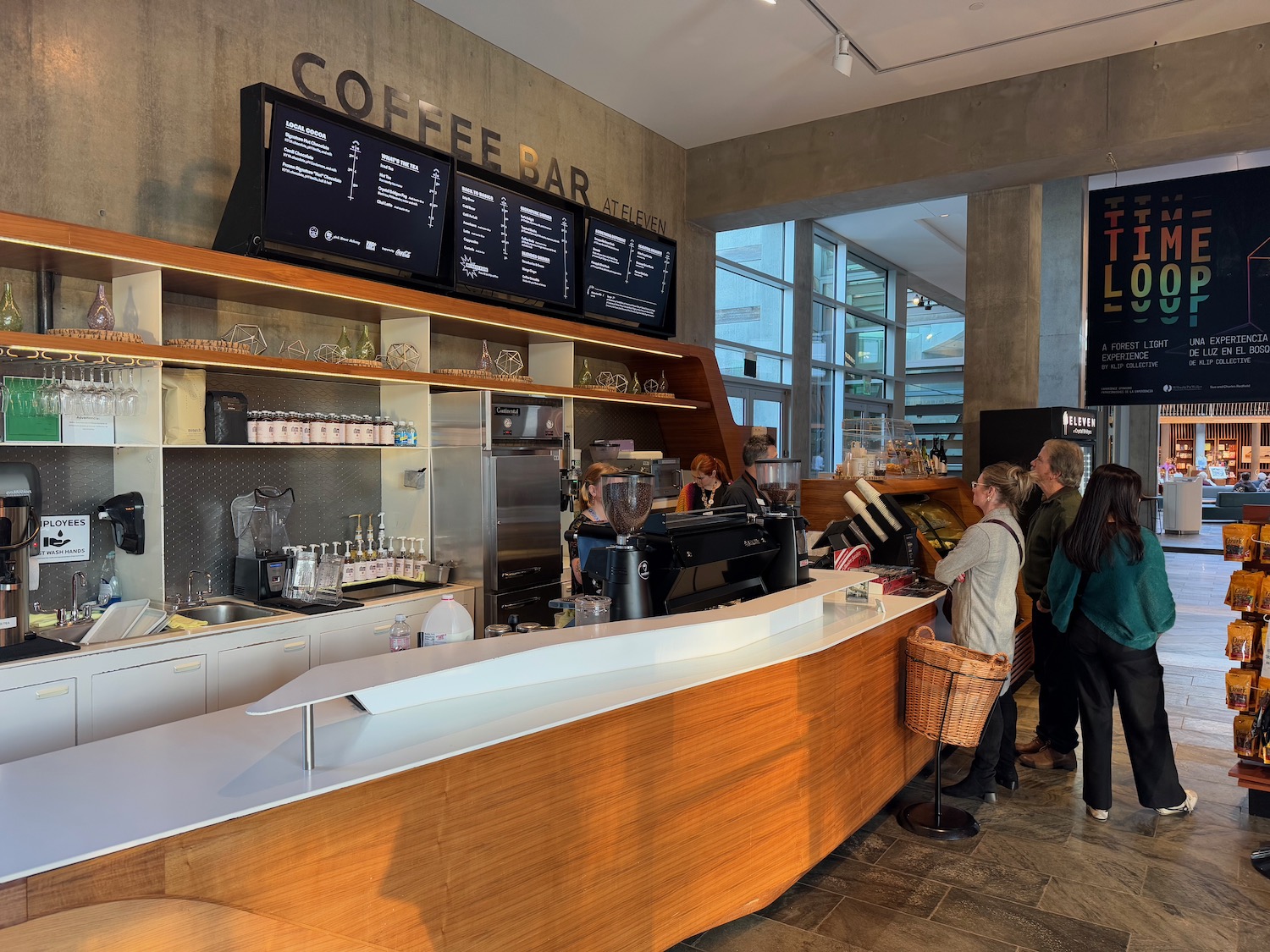 people standing in a coffee shop