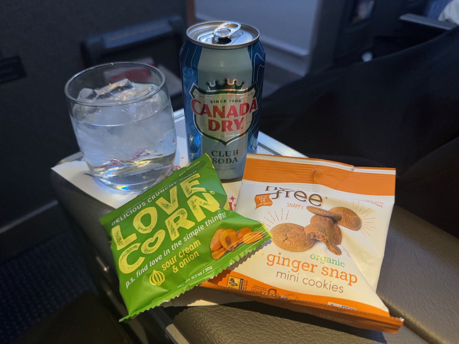 a drink and snacks on a table