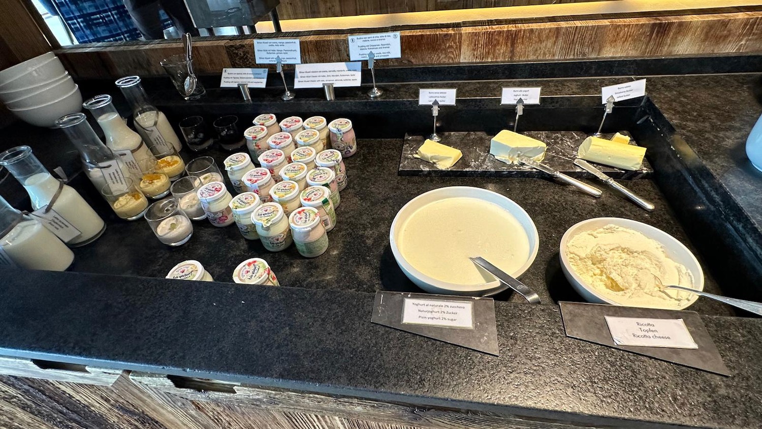 a counter with different types of food on it