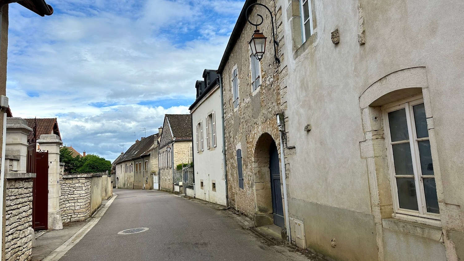 a street with buildings and a street light