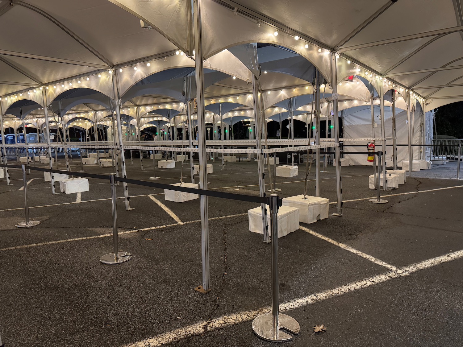 a white tent with lights