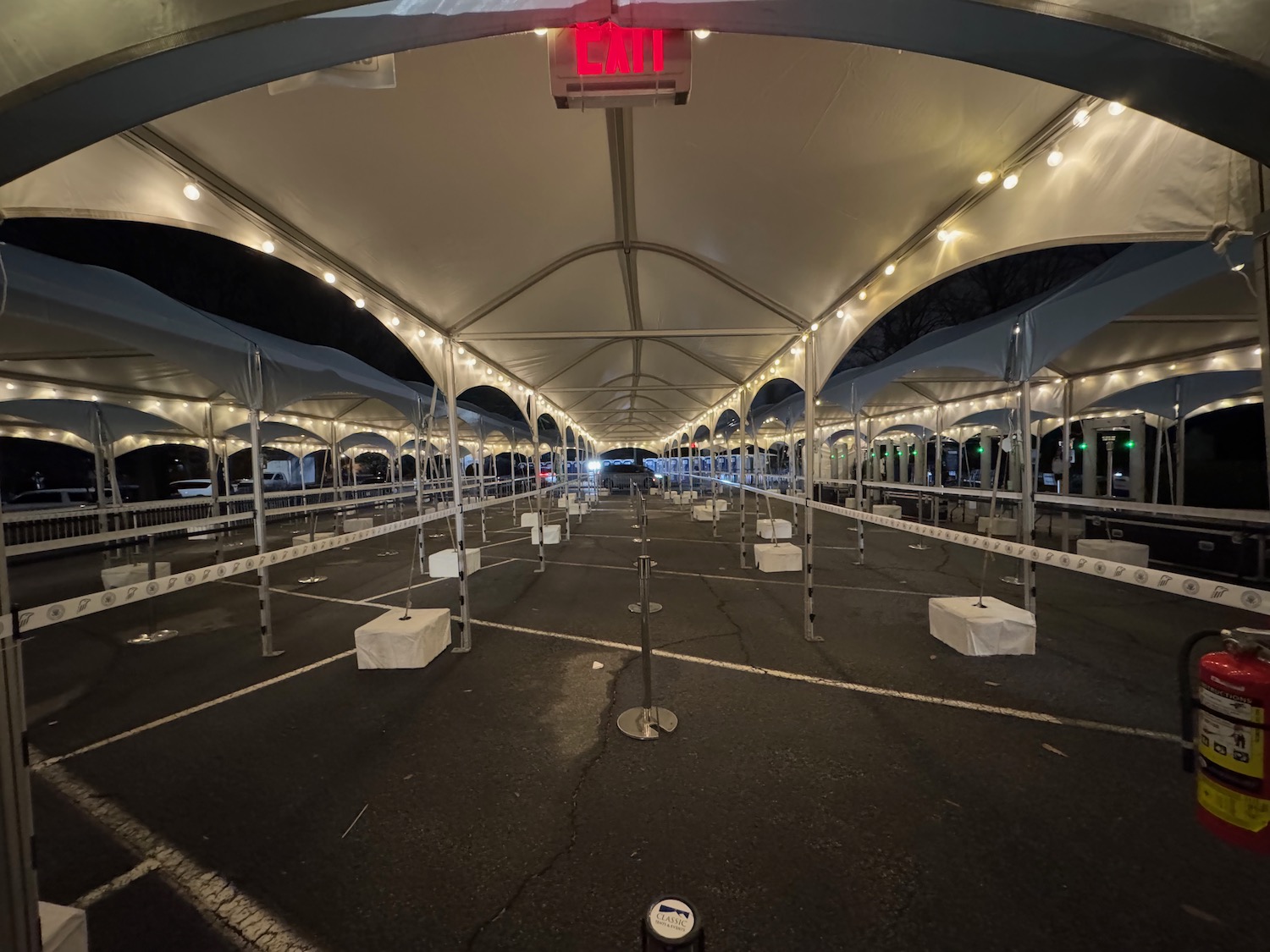 a white canopy with lights on the ceiling