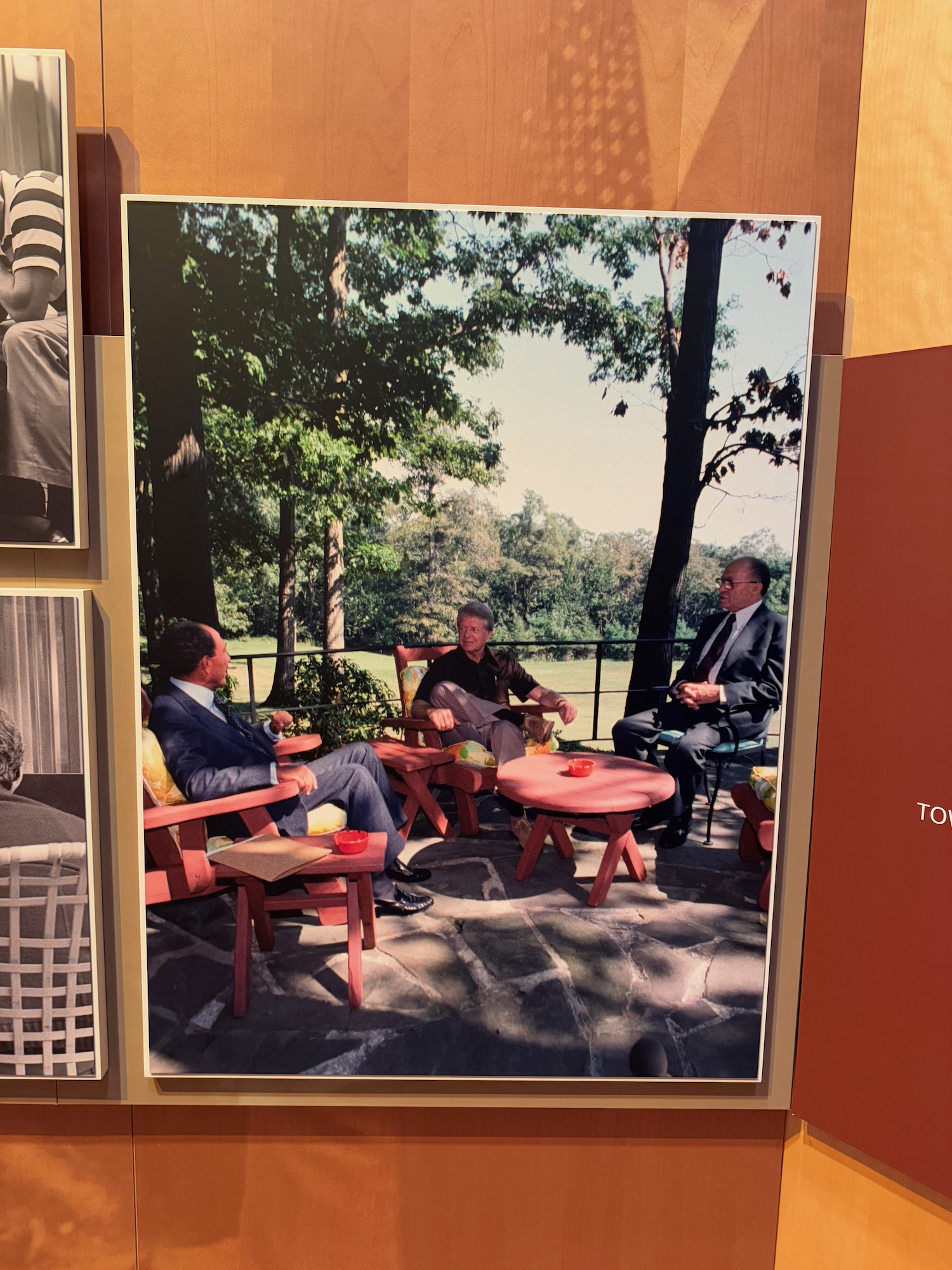 a group of men sitting at a table