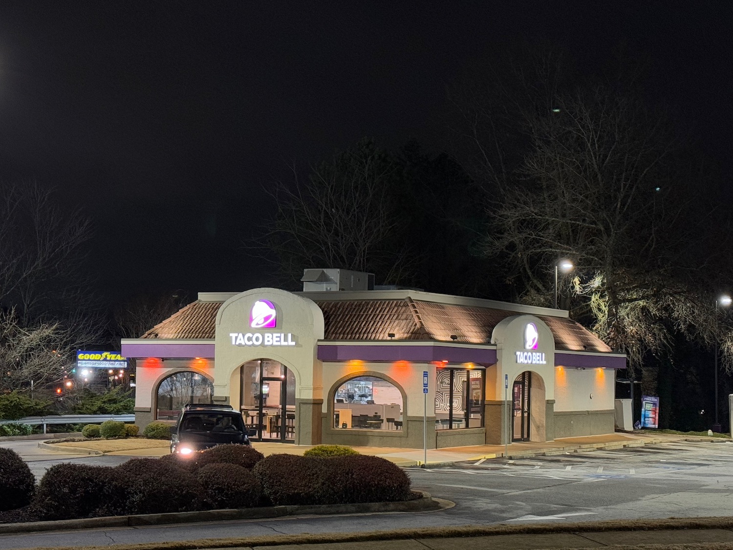 a building with a car parked in front of it