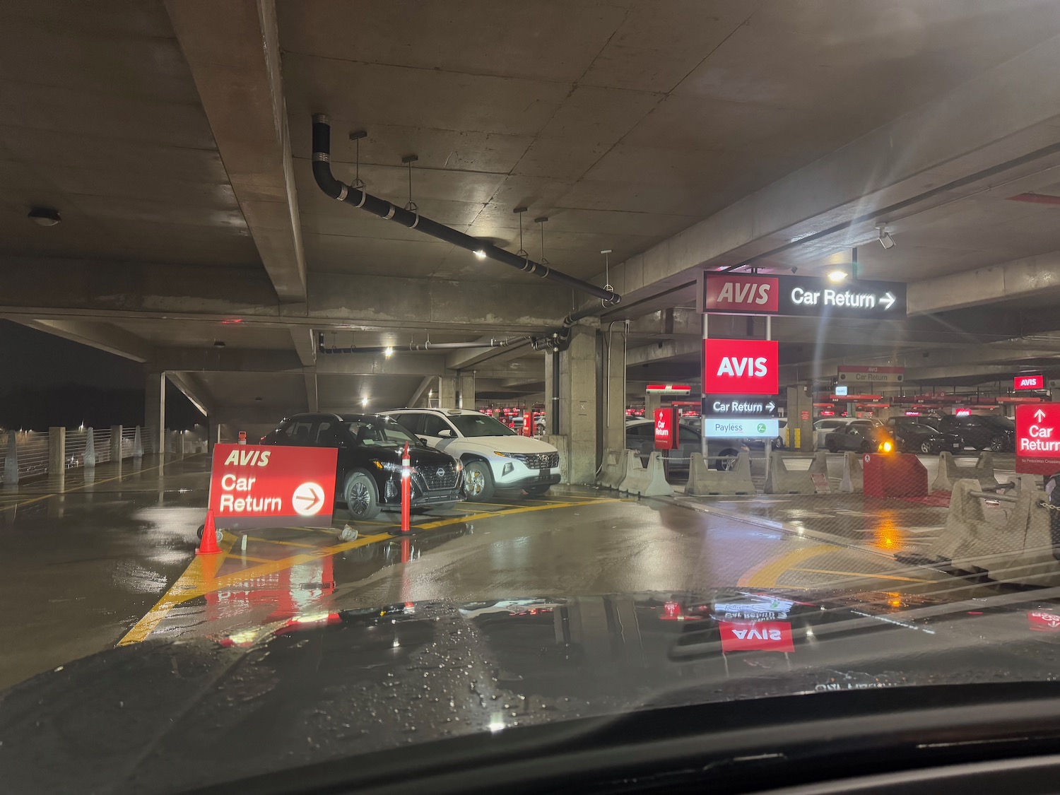 a car parking lot with cars parked in it