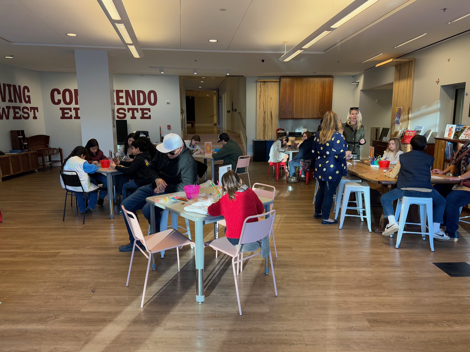 a group of people sitting at tables in a room