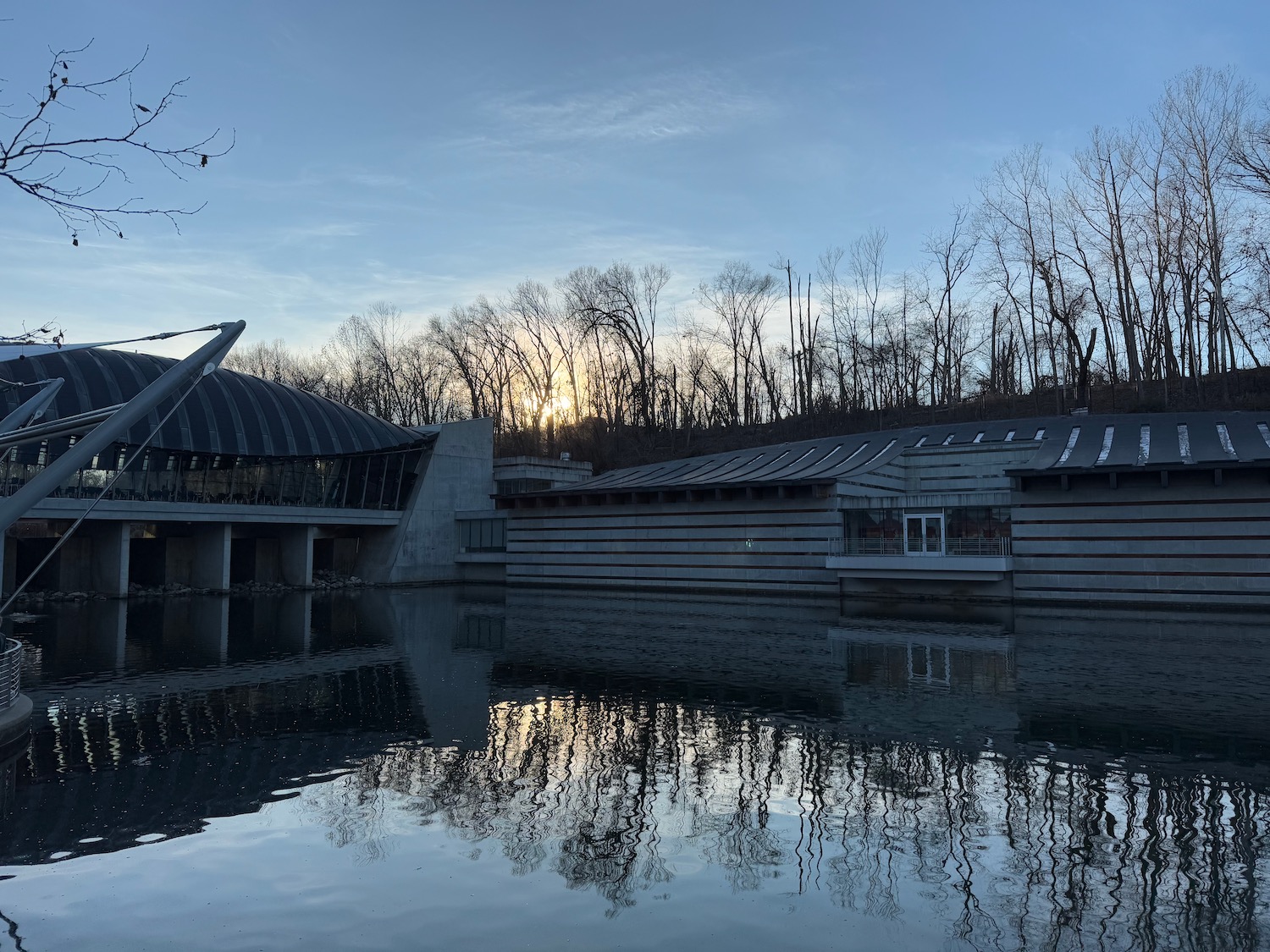 a building next to a body of water