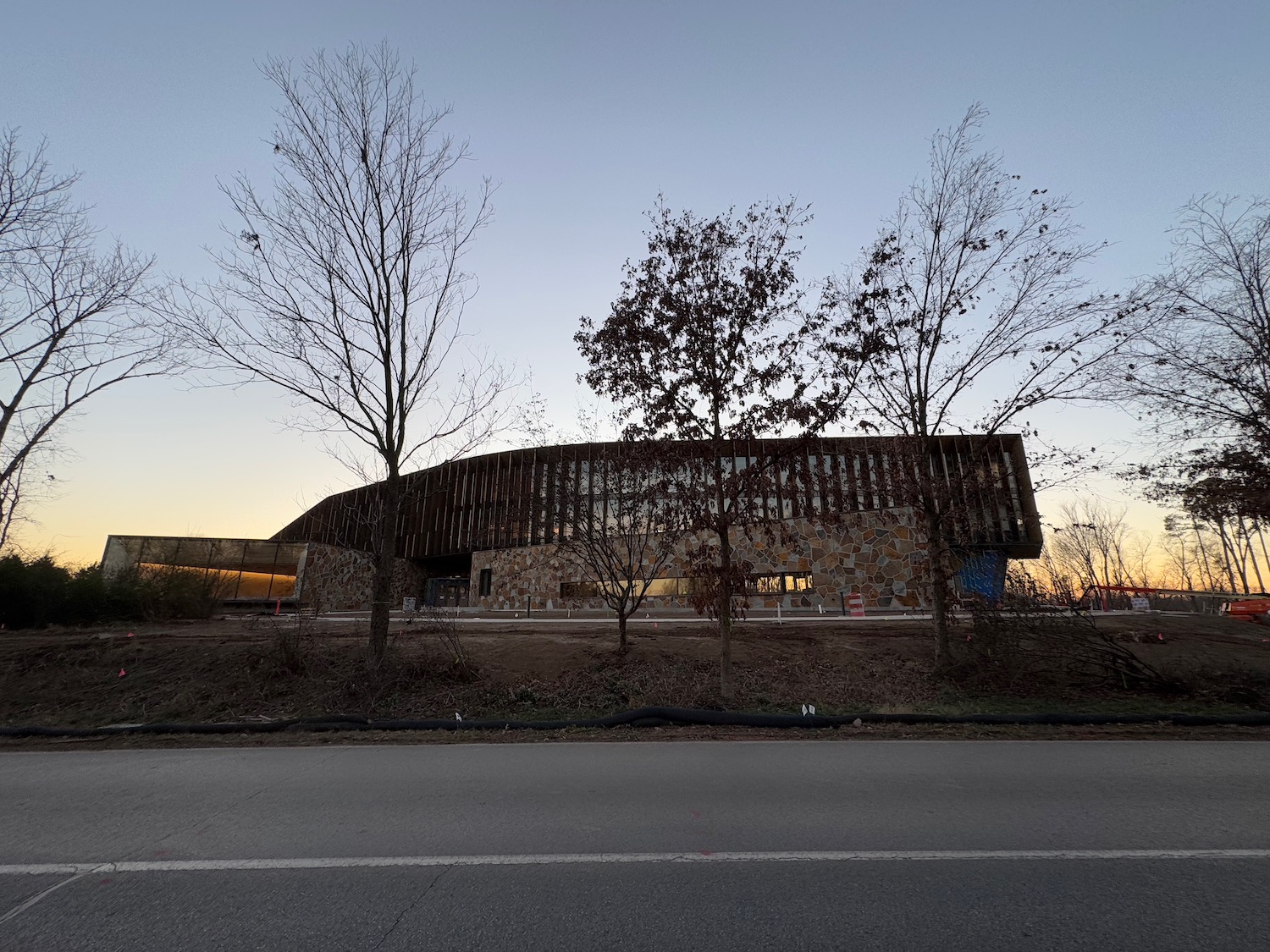 a building with trees in front of it