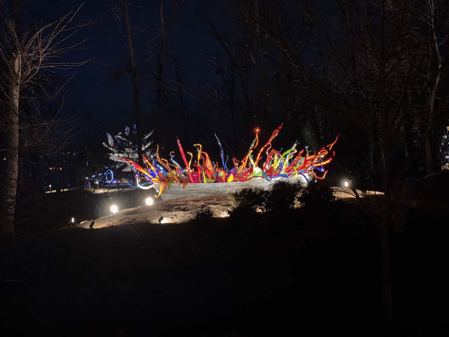 a sculpture of colorful lights at night