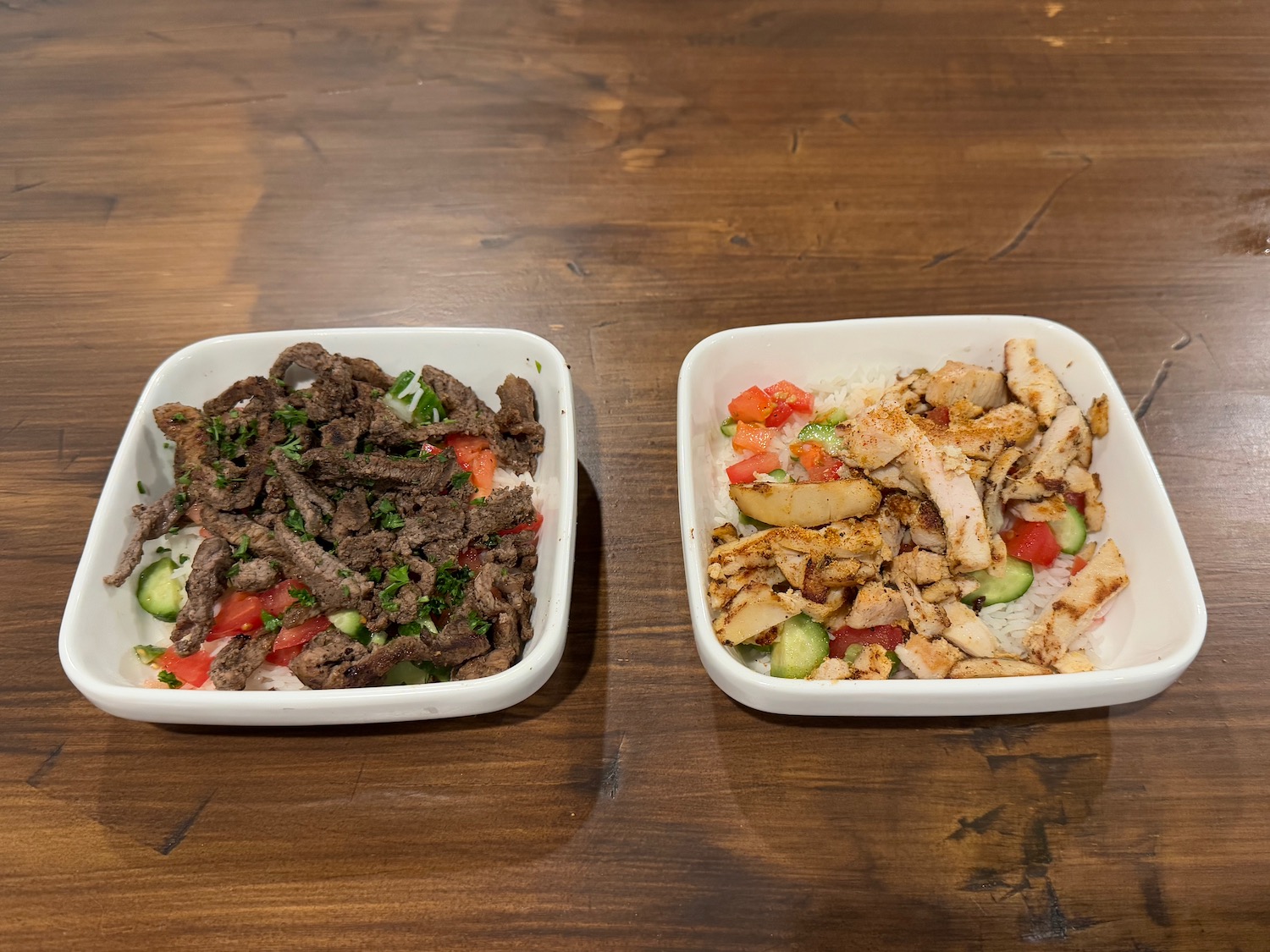 two bowls of food on a table