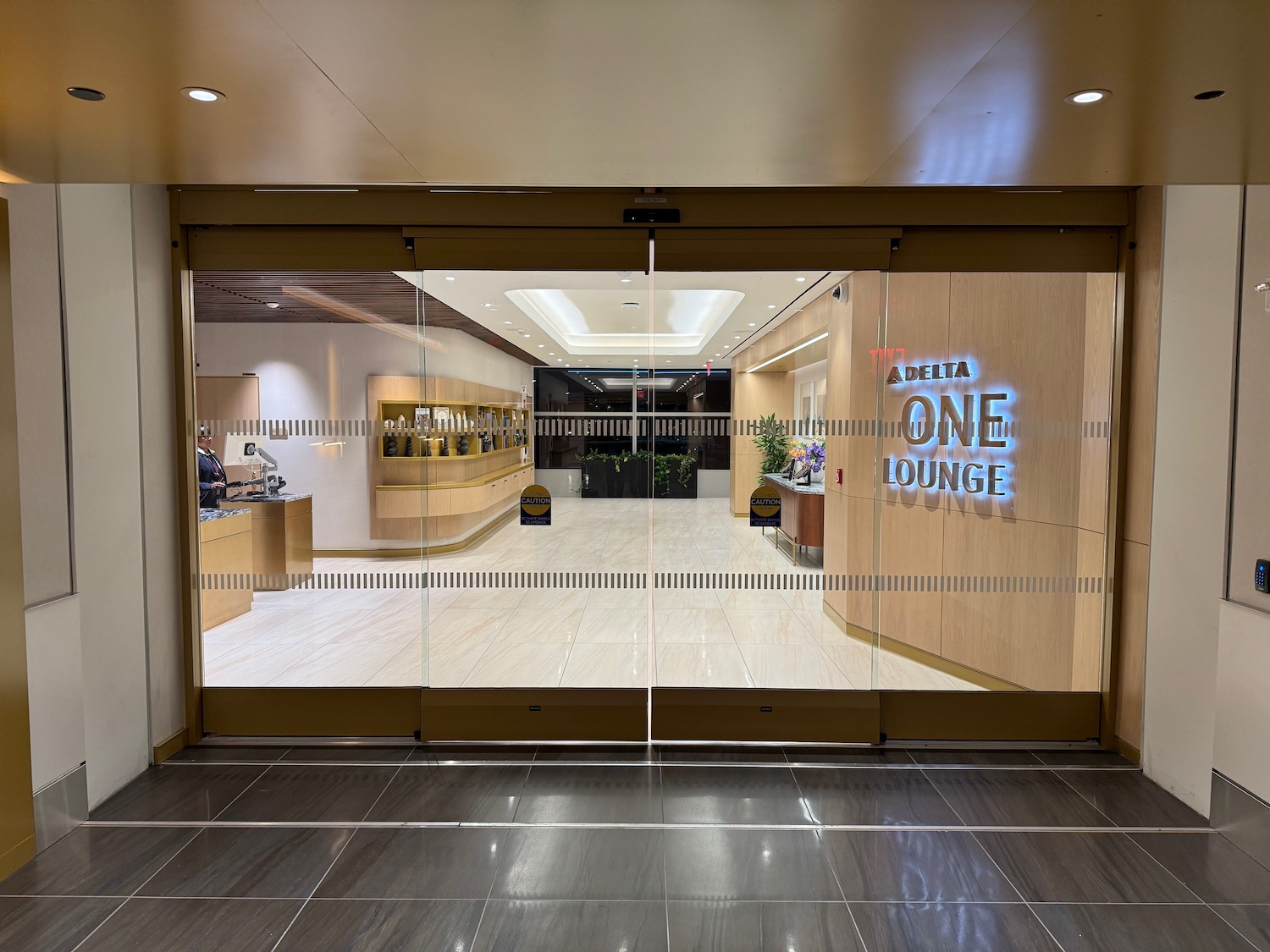 a glass door with a sign on it