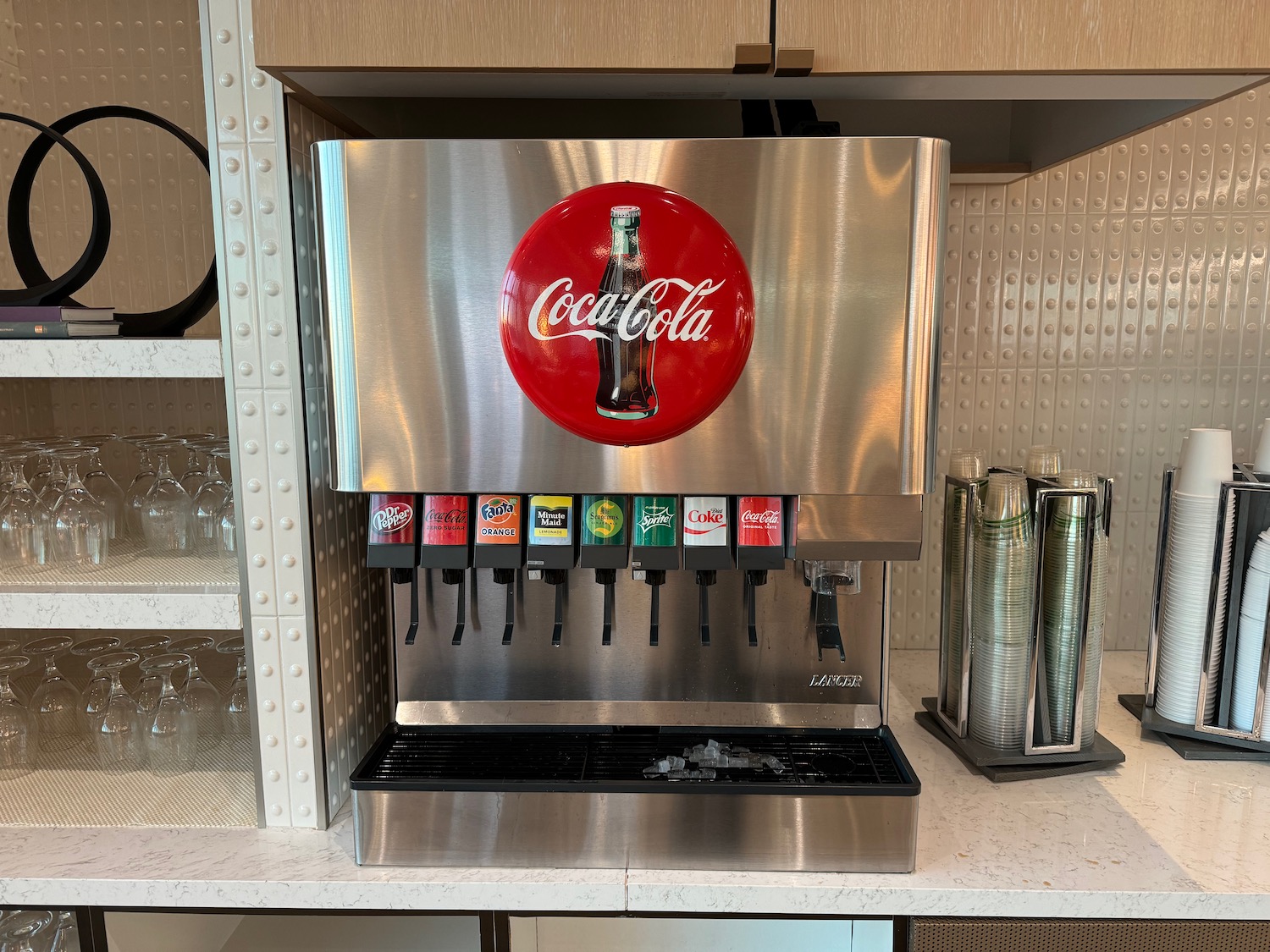 a soda dispenser on a counter