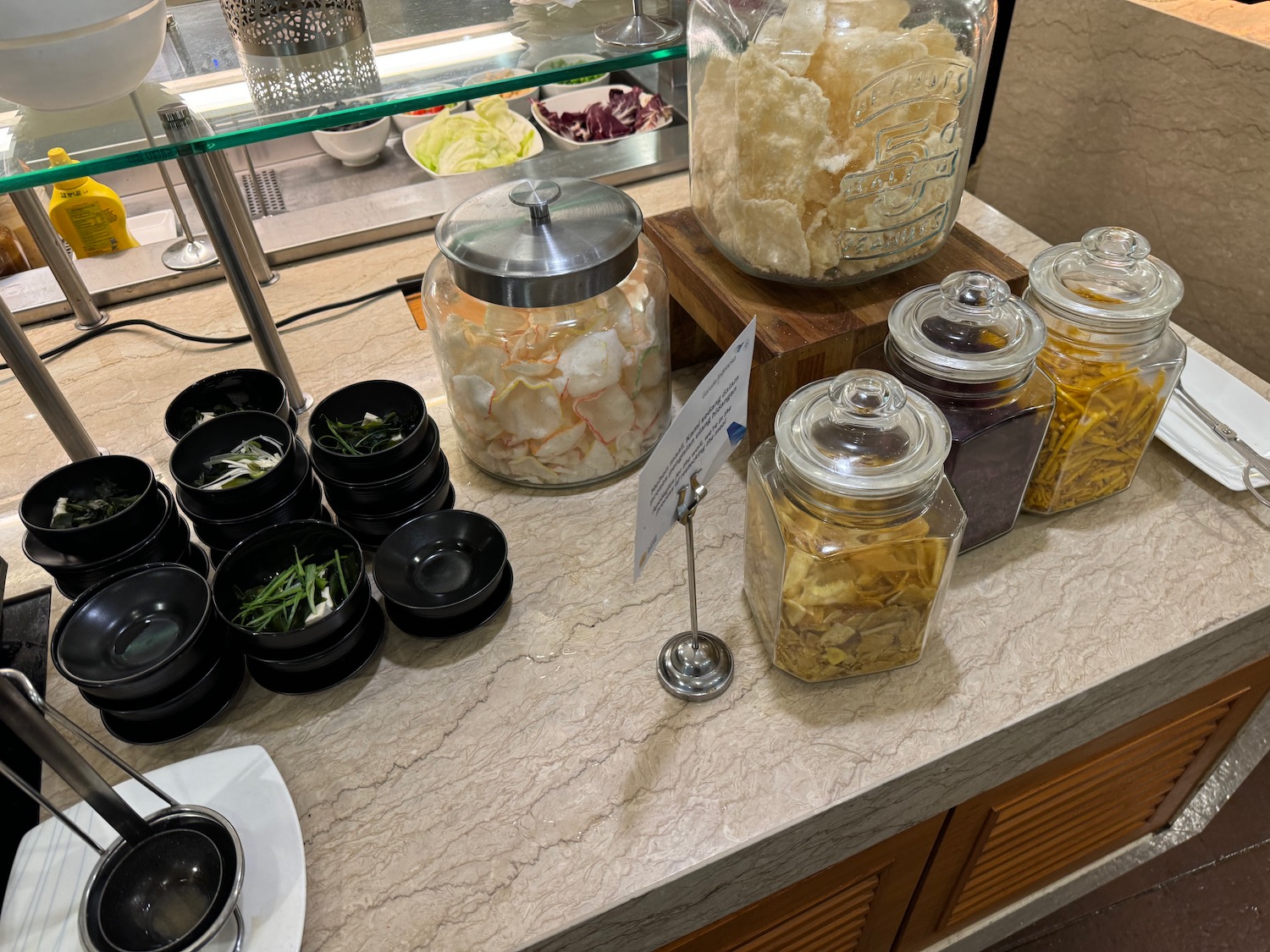 a counter with food items on it