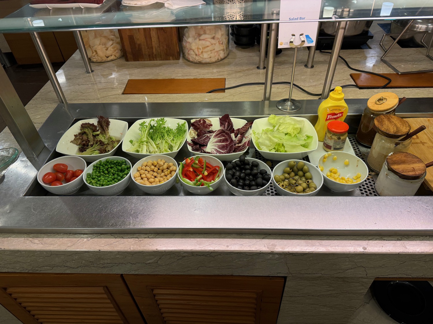 a counter with bowls of food