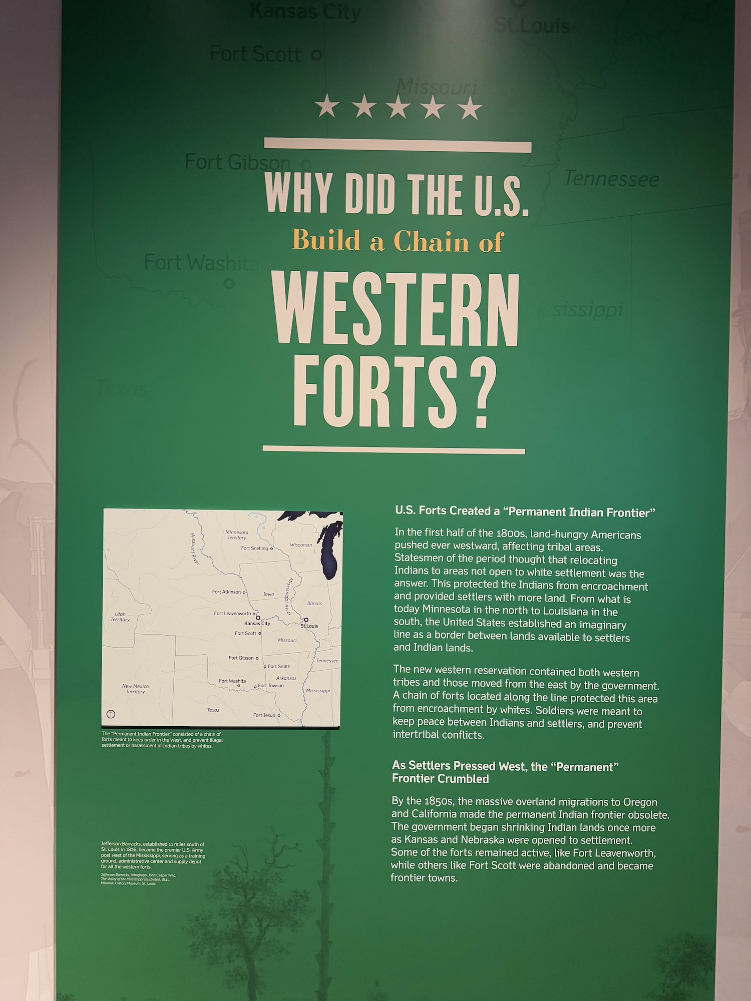 a green poster with white text and a map