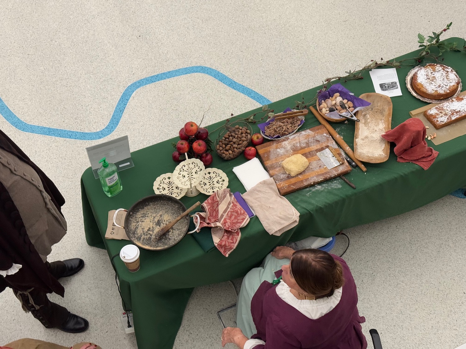 a group of people around a table with food