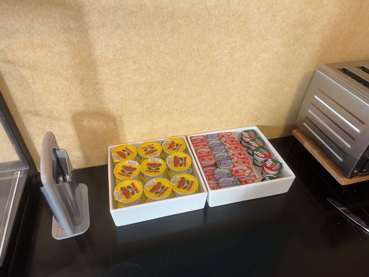 a group of small containers of yogurt in a white box