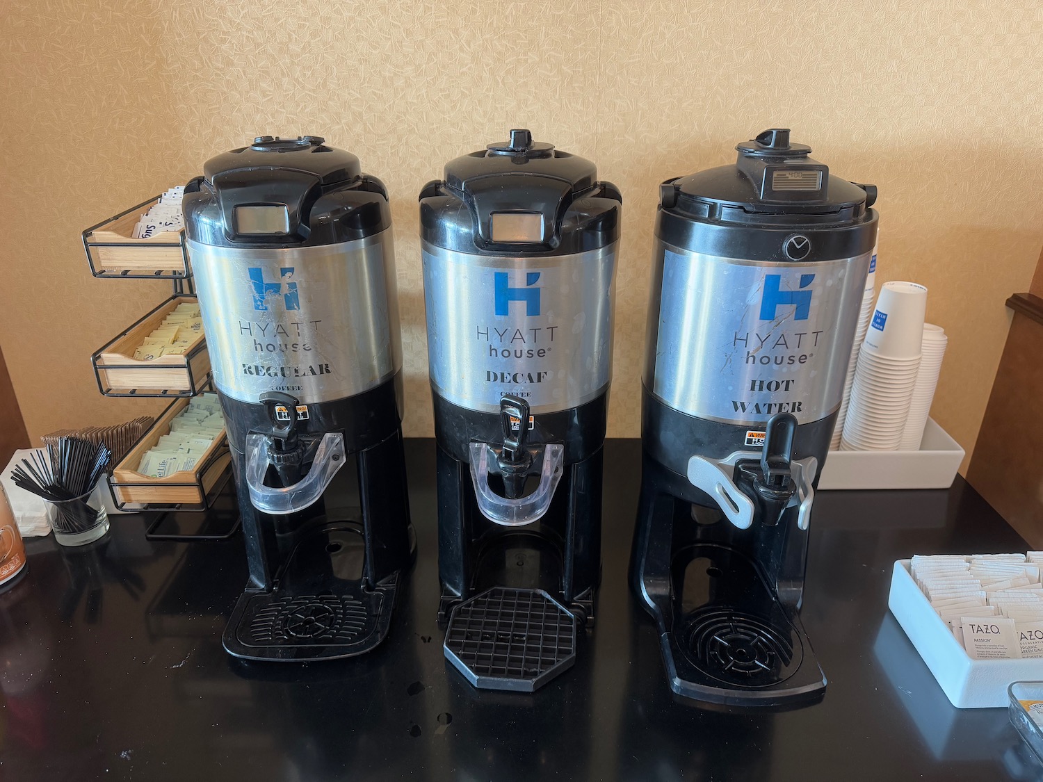 a group of coffee machines on a table