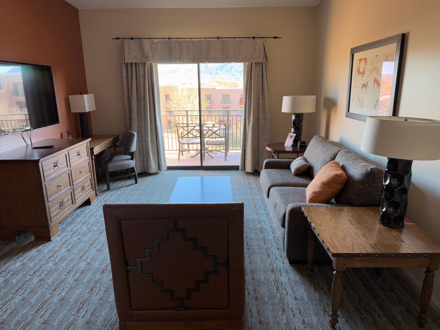 a living room with a couch and a table