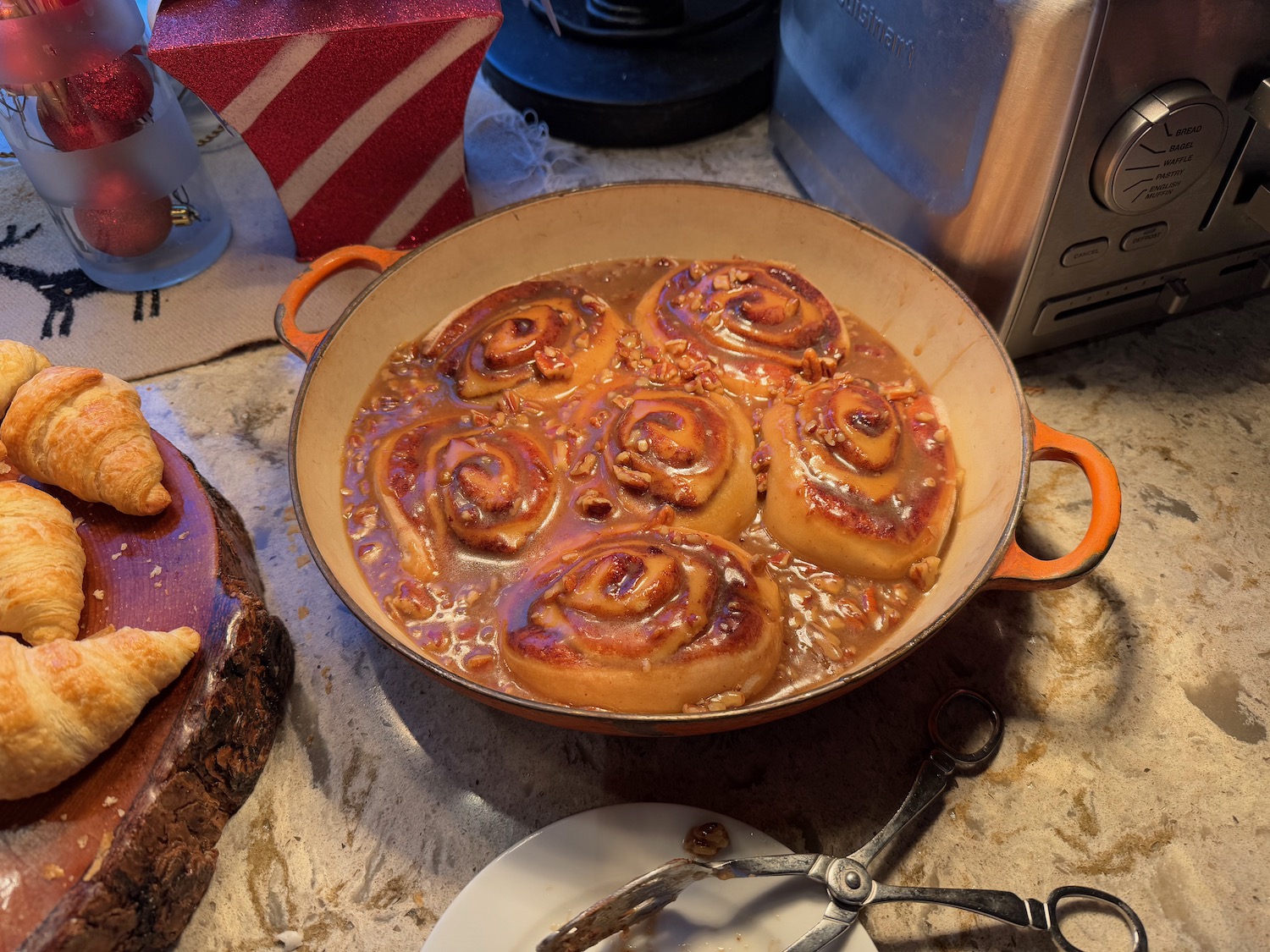 a bowl of cinnamon rolls in brown sauce