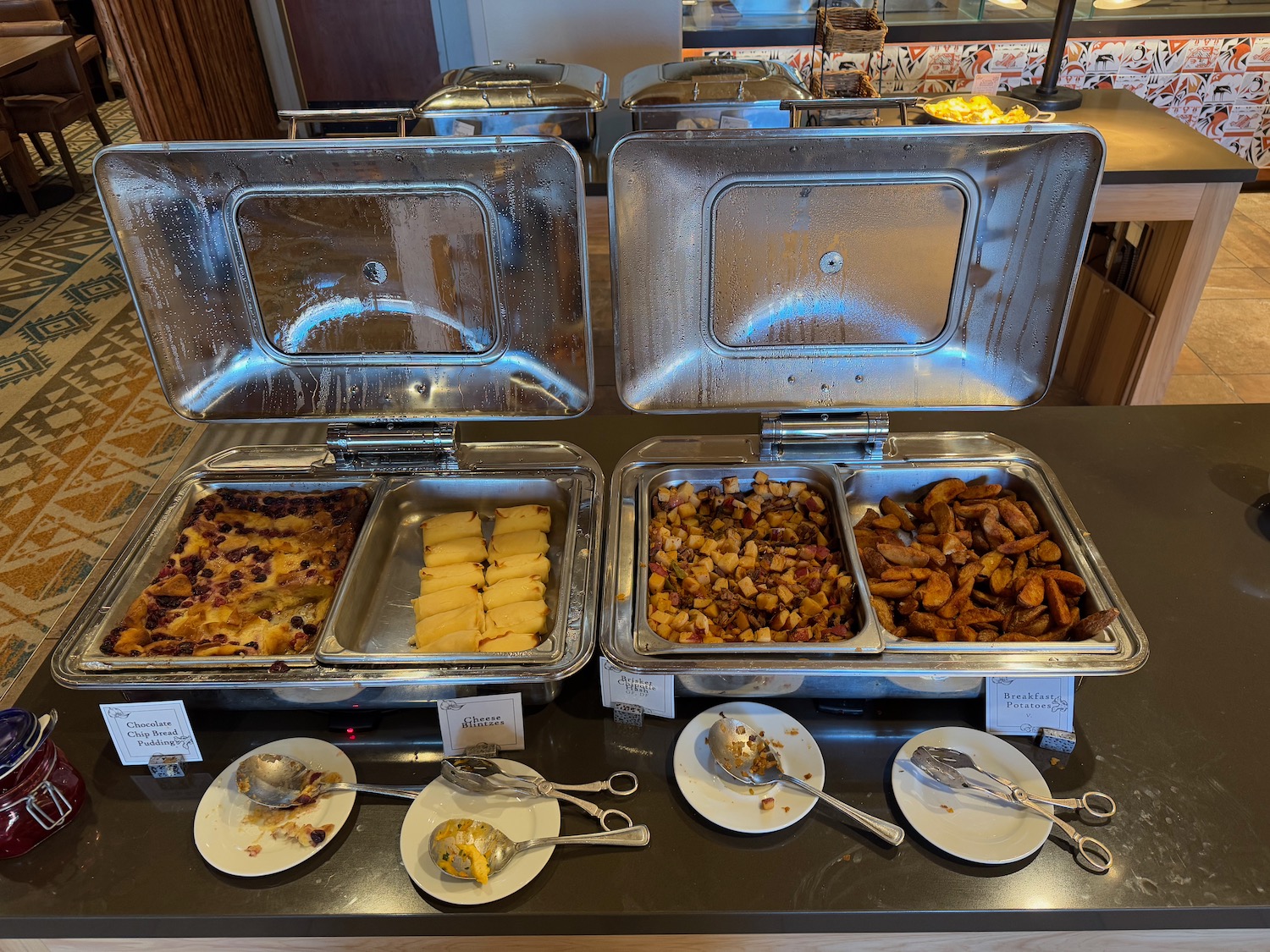 a buffet with food in containers