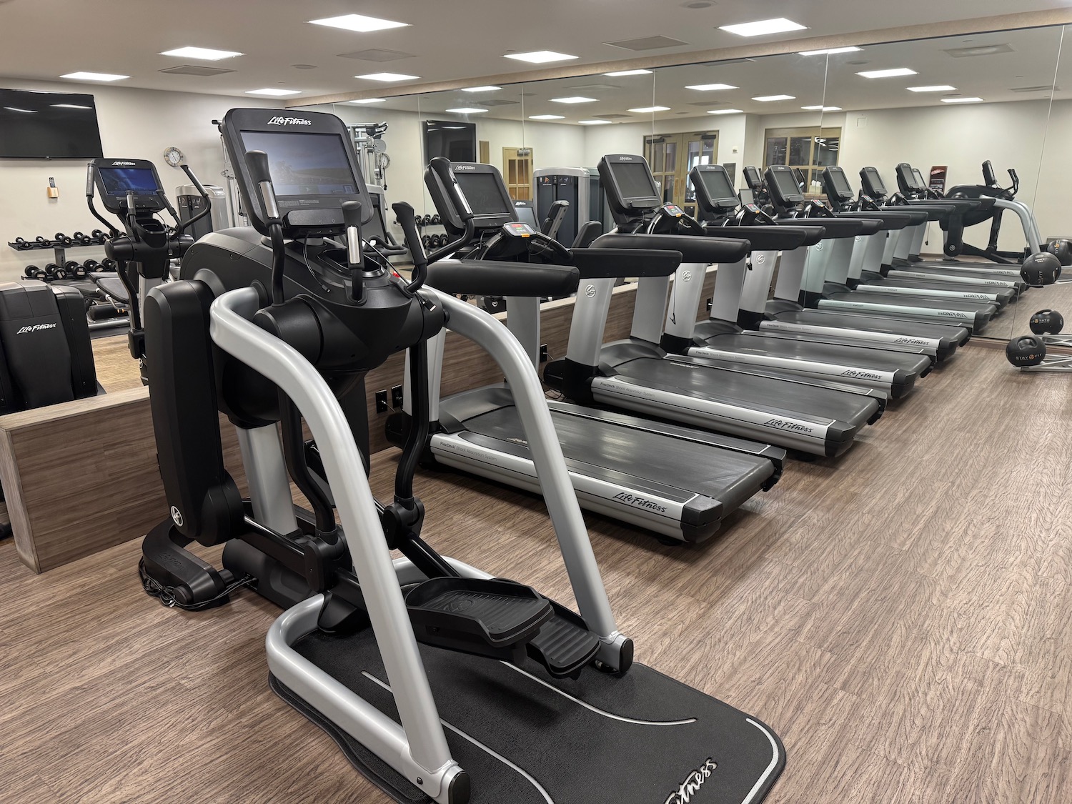 a group of treadmills in a gym