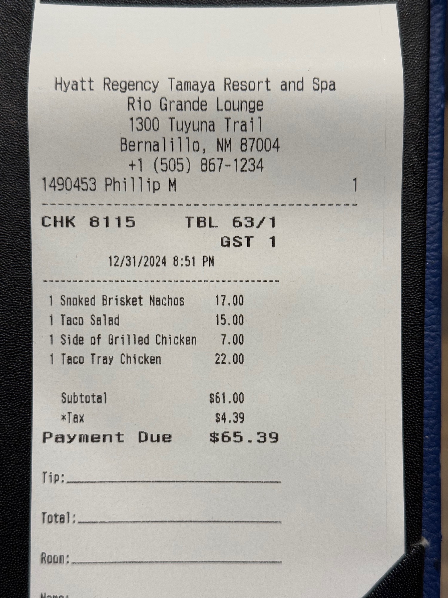 a receipt on a leather cover