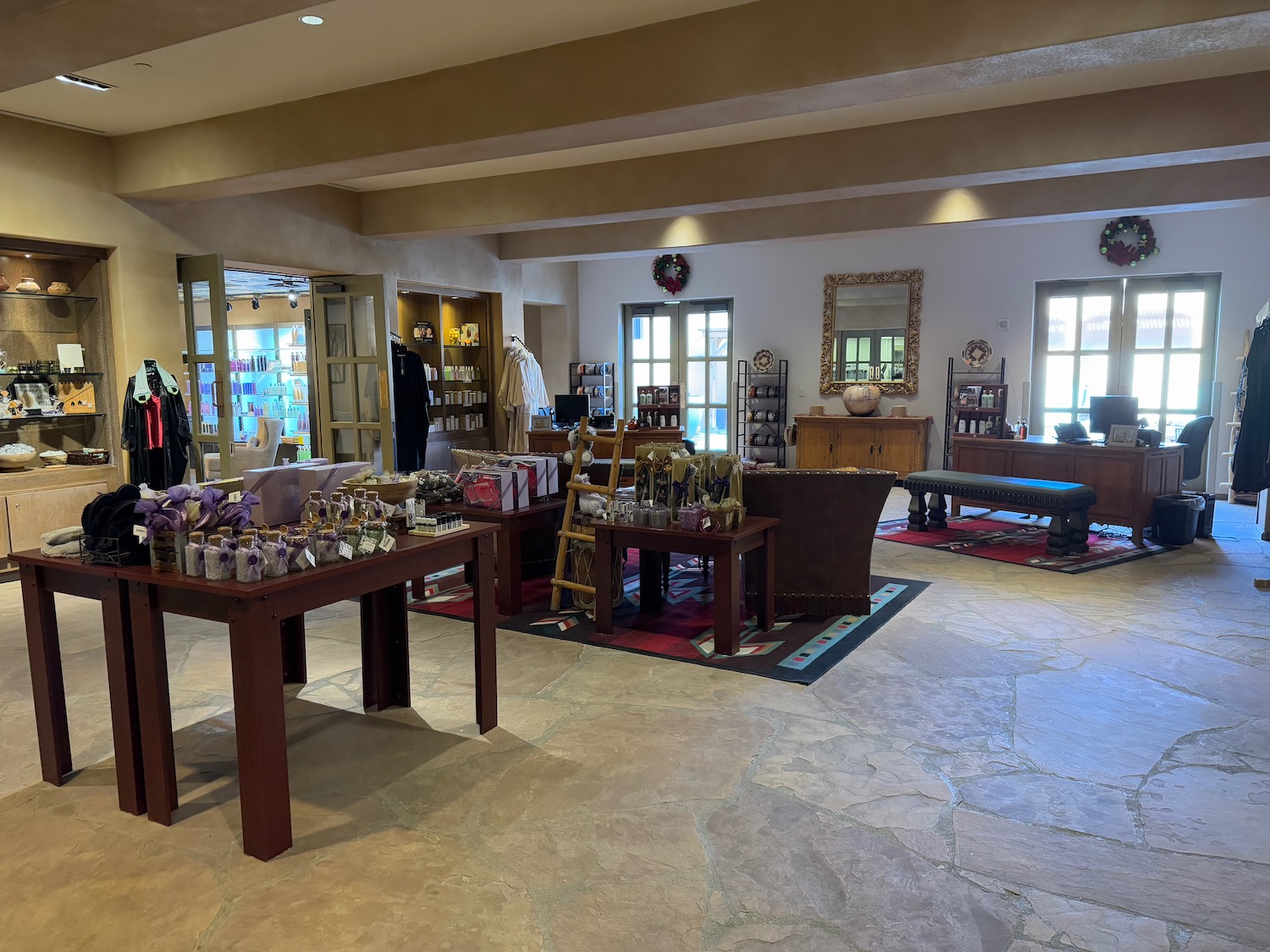 a room with a store with a table and chairs