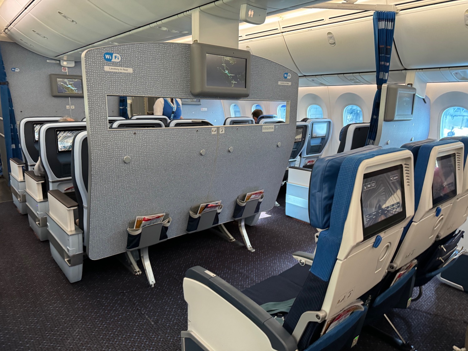 an airplane with seats and a screen